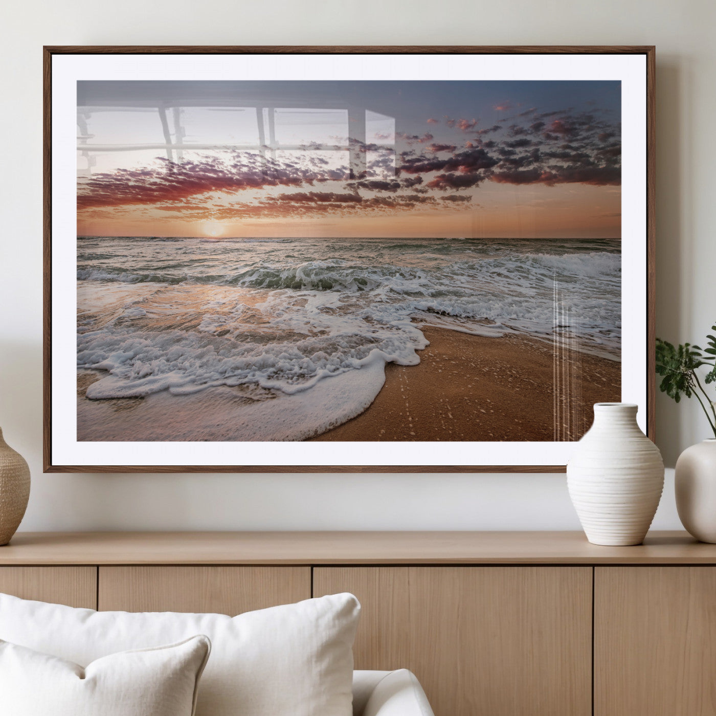Canvas of a sunset over a foamy ocean shore with warm light and gentle waves, ideal for coastal or beach-themed home decor.