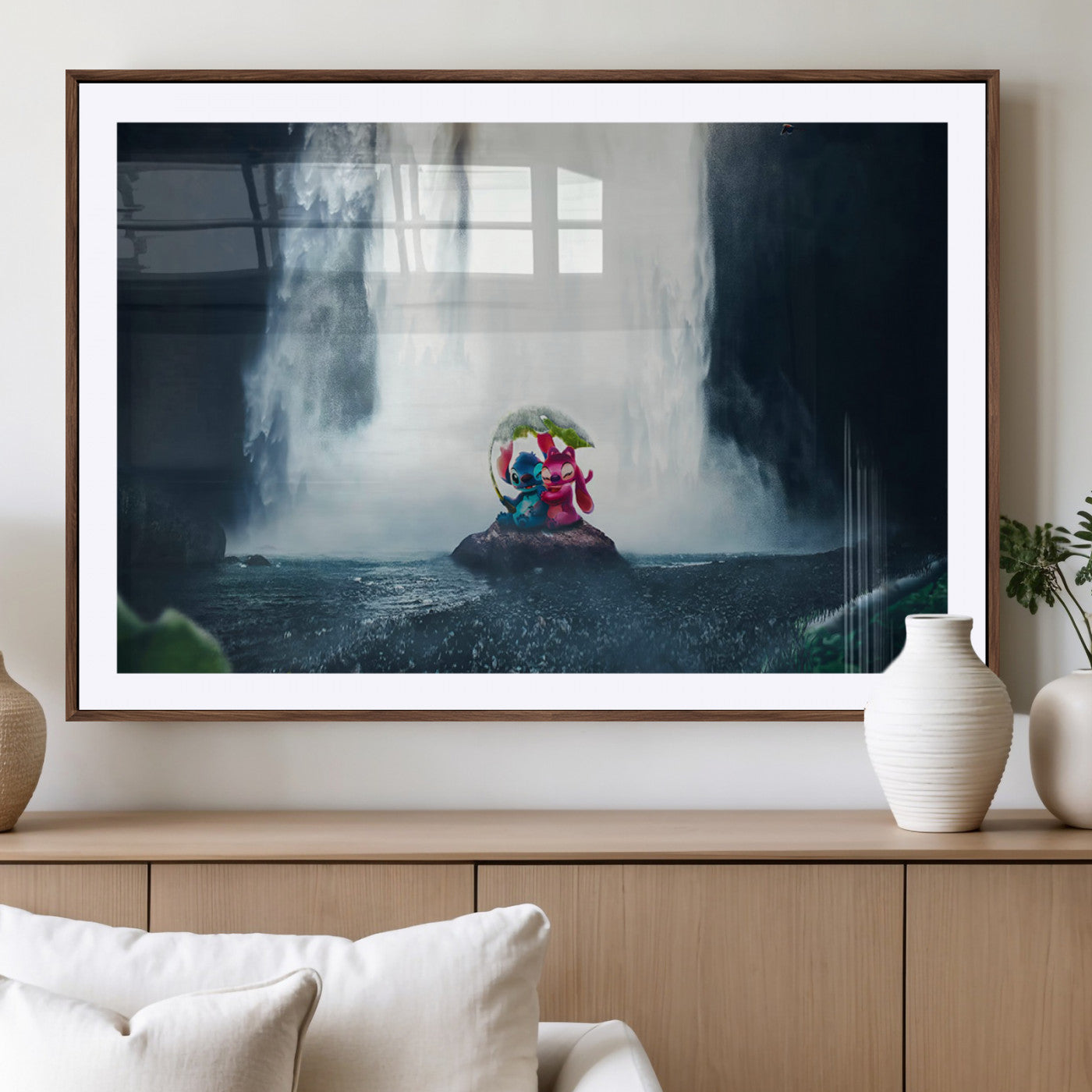 Fantasy canvas of Stitch and Angel under a leaf umbrella in front of a dramatic waterfall, perfect for moody jungle-themed or animated decor.