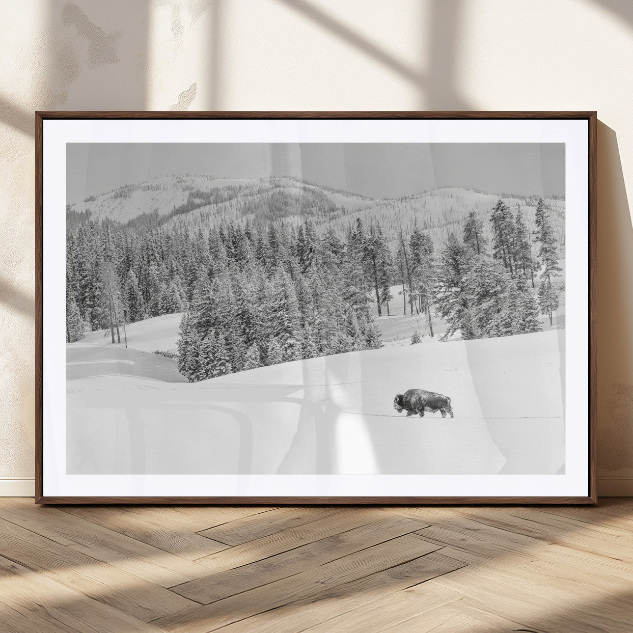 Snowy bison walking through white forest landscape, ideal for monochrome winter or wilderness-style interior wall decoration.
