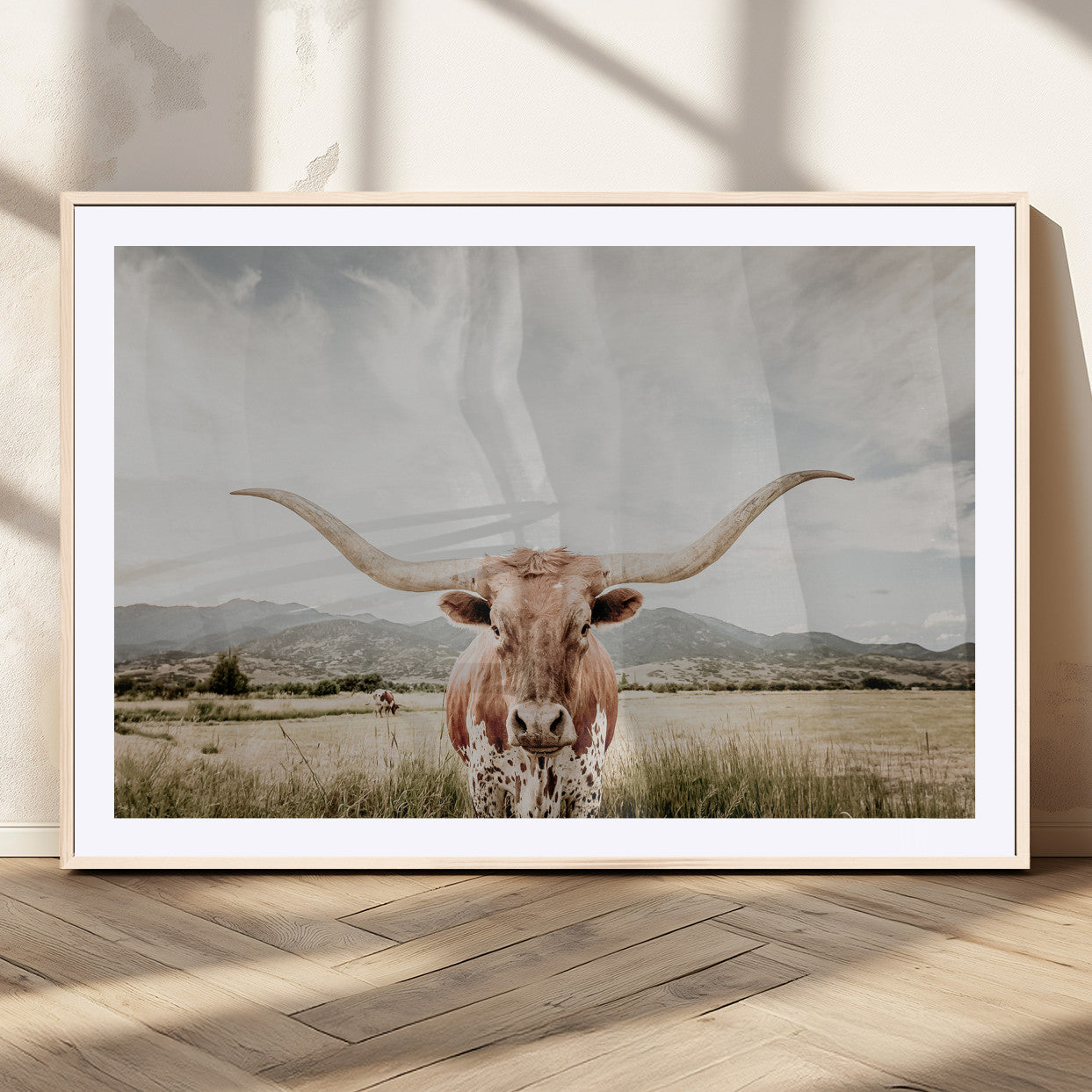 Longhorn Wall Art Print - Western Cow Canvas Print, featuring a majestic Texas longhorn in a rustic prairie setting, perfect for farmhouse and western decor.