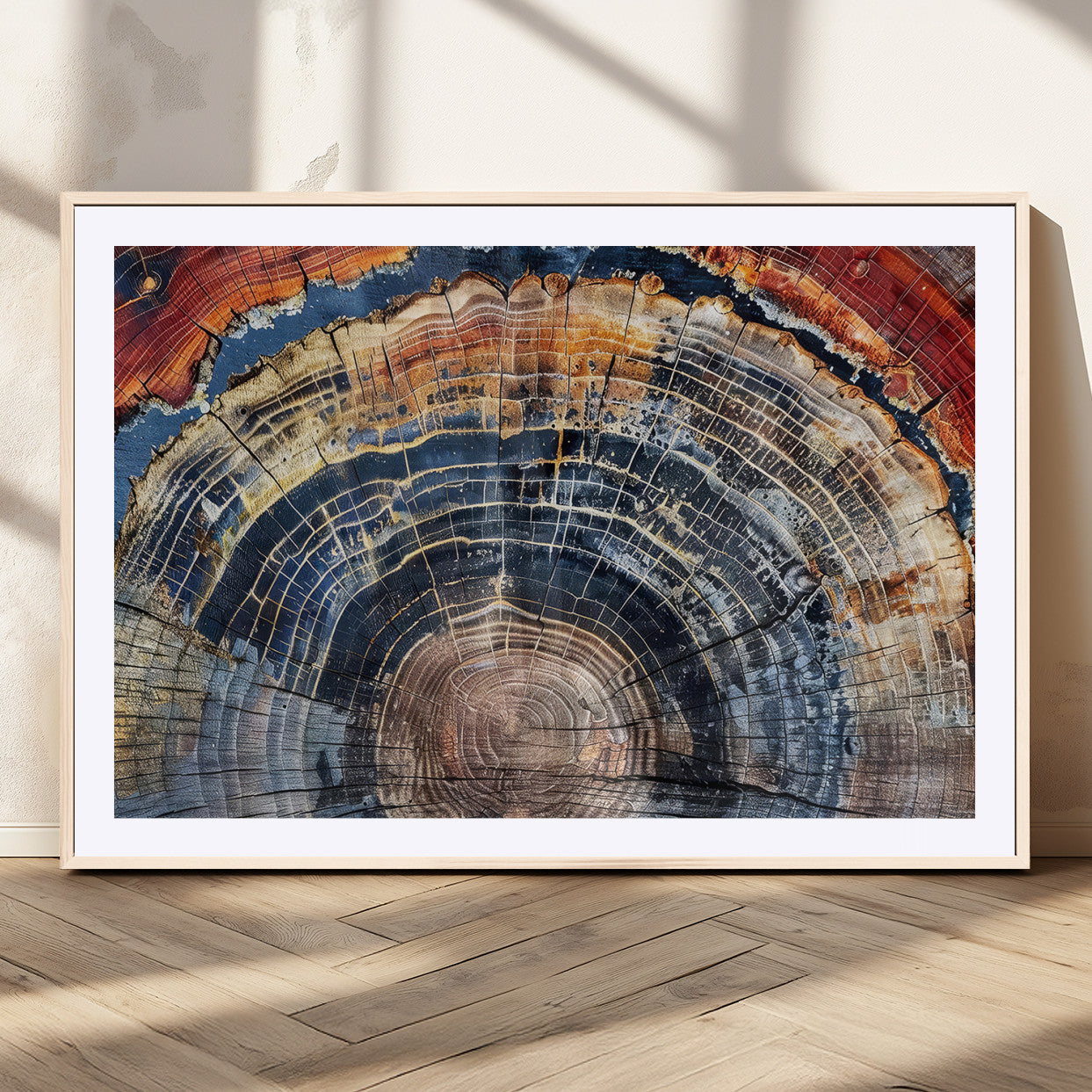 Vibrant tree ring with orange, brown, and blue tones in abstract detail, perfect for rustic or boho-inspired wall decor.