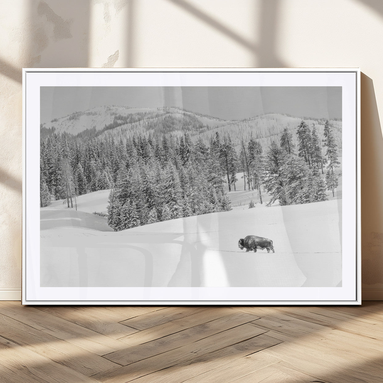 Snowy bison walking through white forest landscape, ideal for monochrome winter or wilderness-style interior wall decoration.