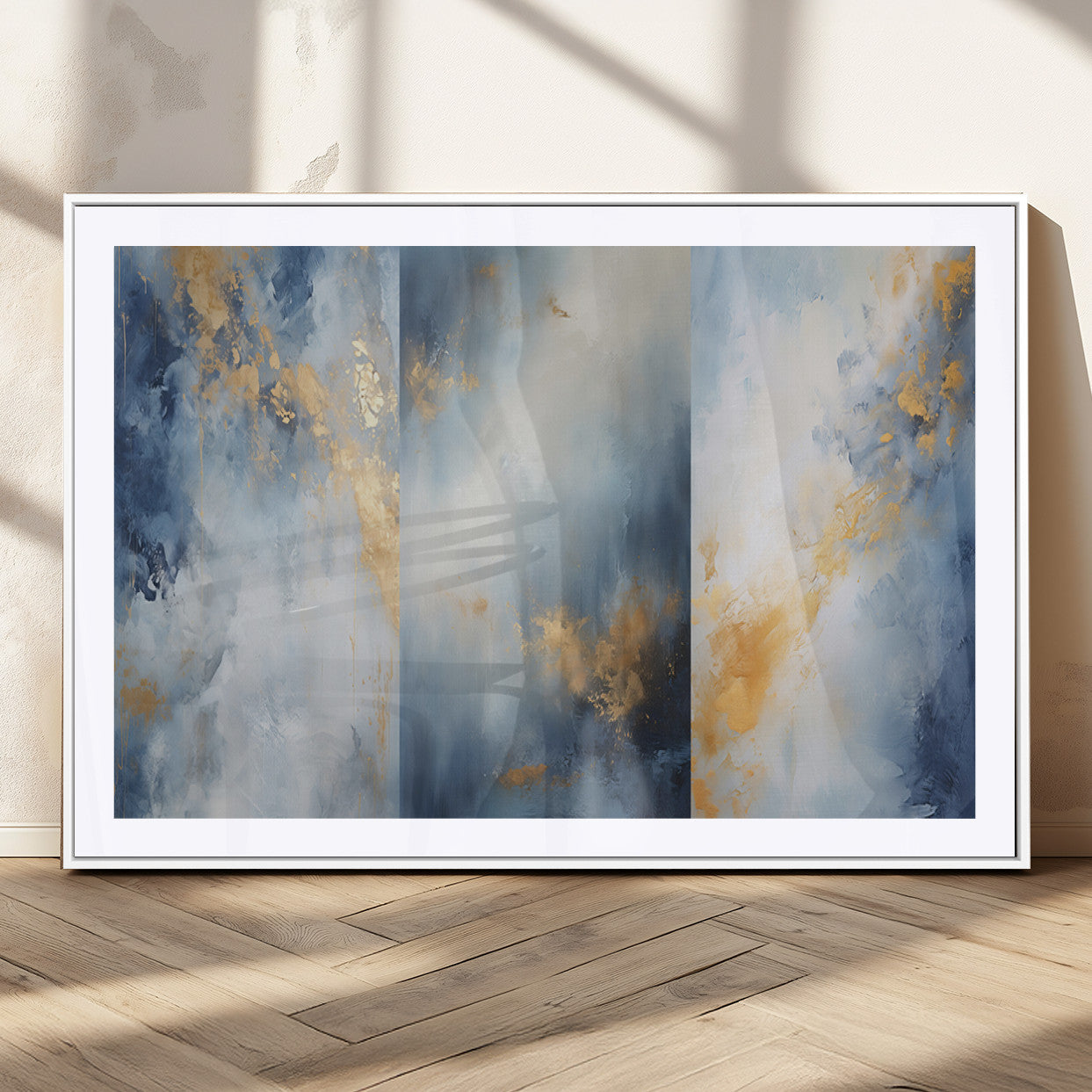 Abstract canvas art in soft blue and gold tones with textured brushstrokes, ideal for elegant or modern neutral decor spaces.