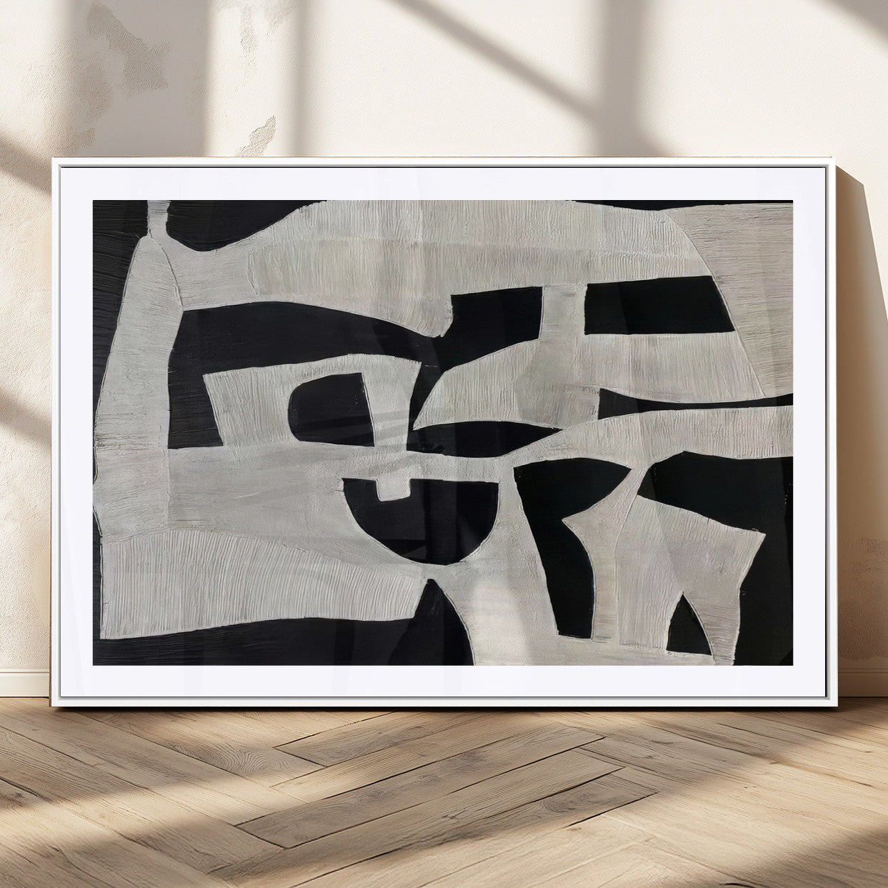 Minimalist black and white canvas featuring bold abstract textures and geometric shapes, ideal for modern neutral decor.