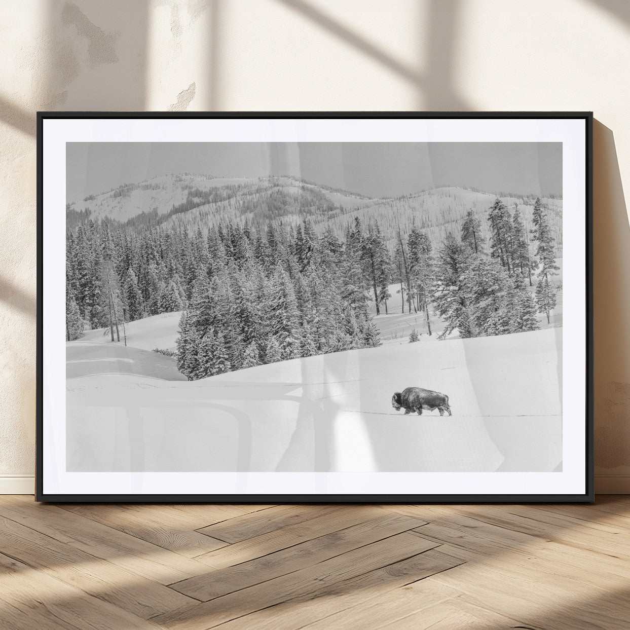 Snowy bison walking through white forest landscape, ideal for monochrome winter or wilderness-style interior wall decoration.