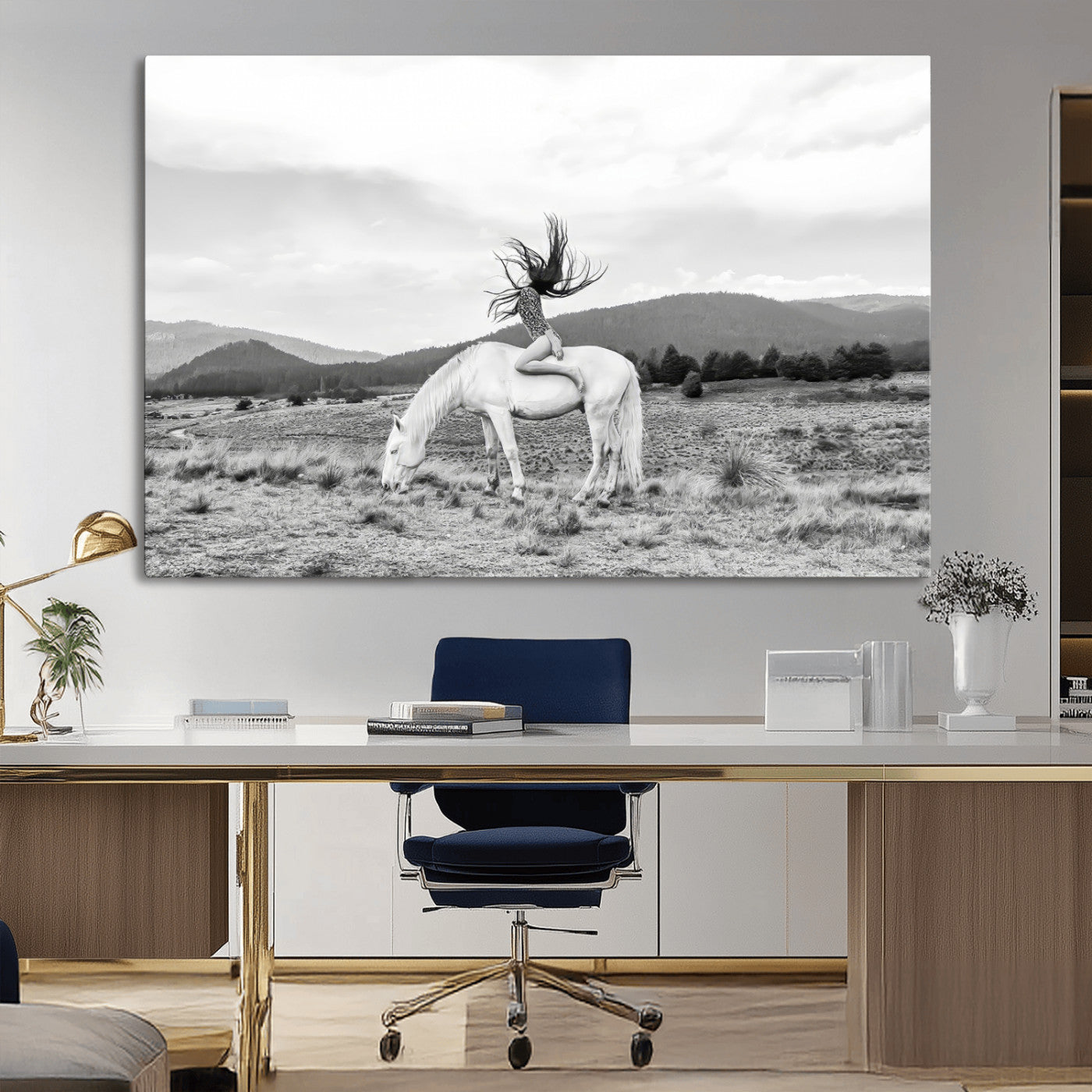 Black and white photo of a woman on a white horse in moody tones, ideal for Western Boho or modern rustic-style home decor.