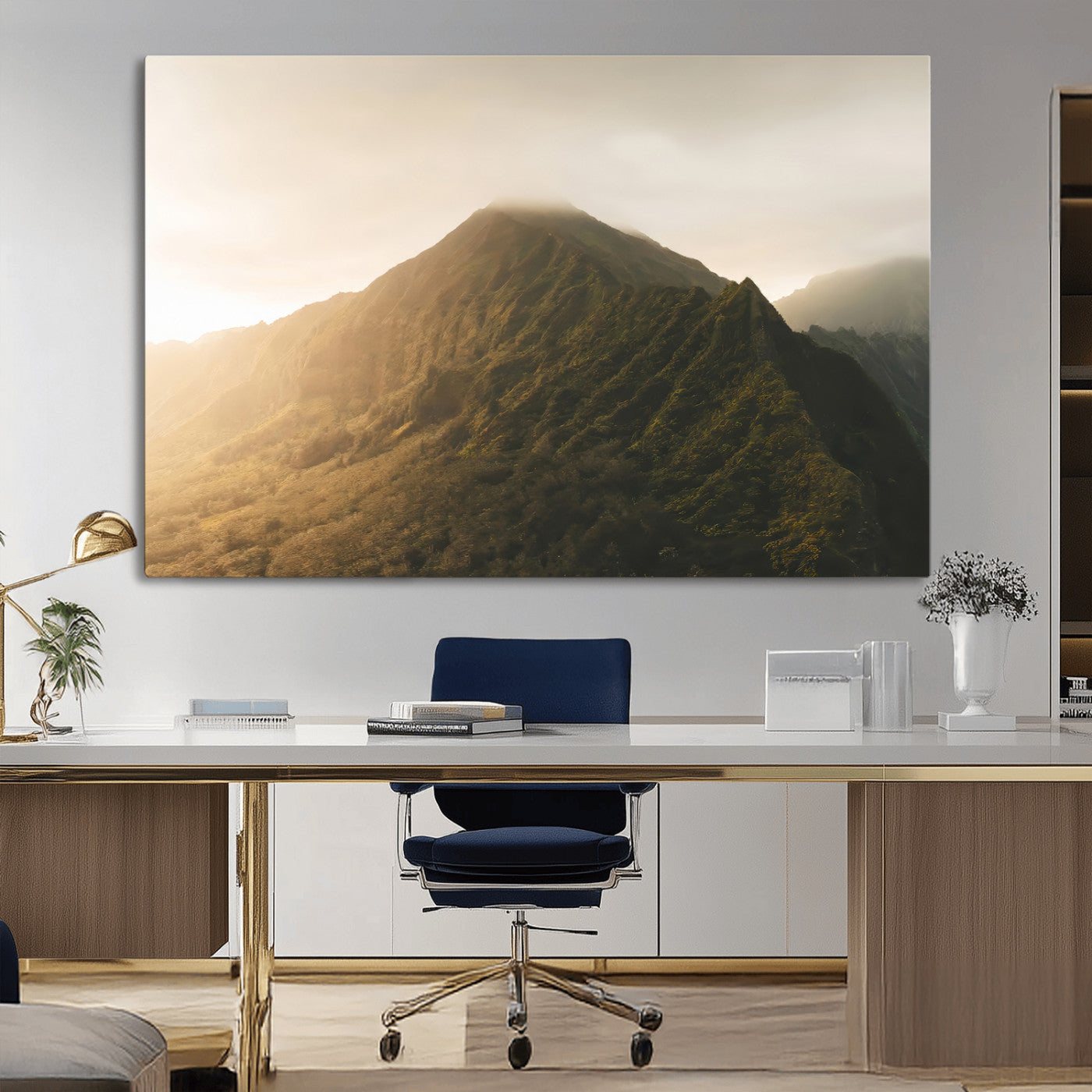 Sunlit mountain peak with mist rolling over its rugged slopes, bathed in golden light, creating a warm and tranquil nature-inspired scene.