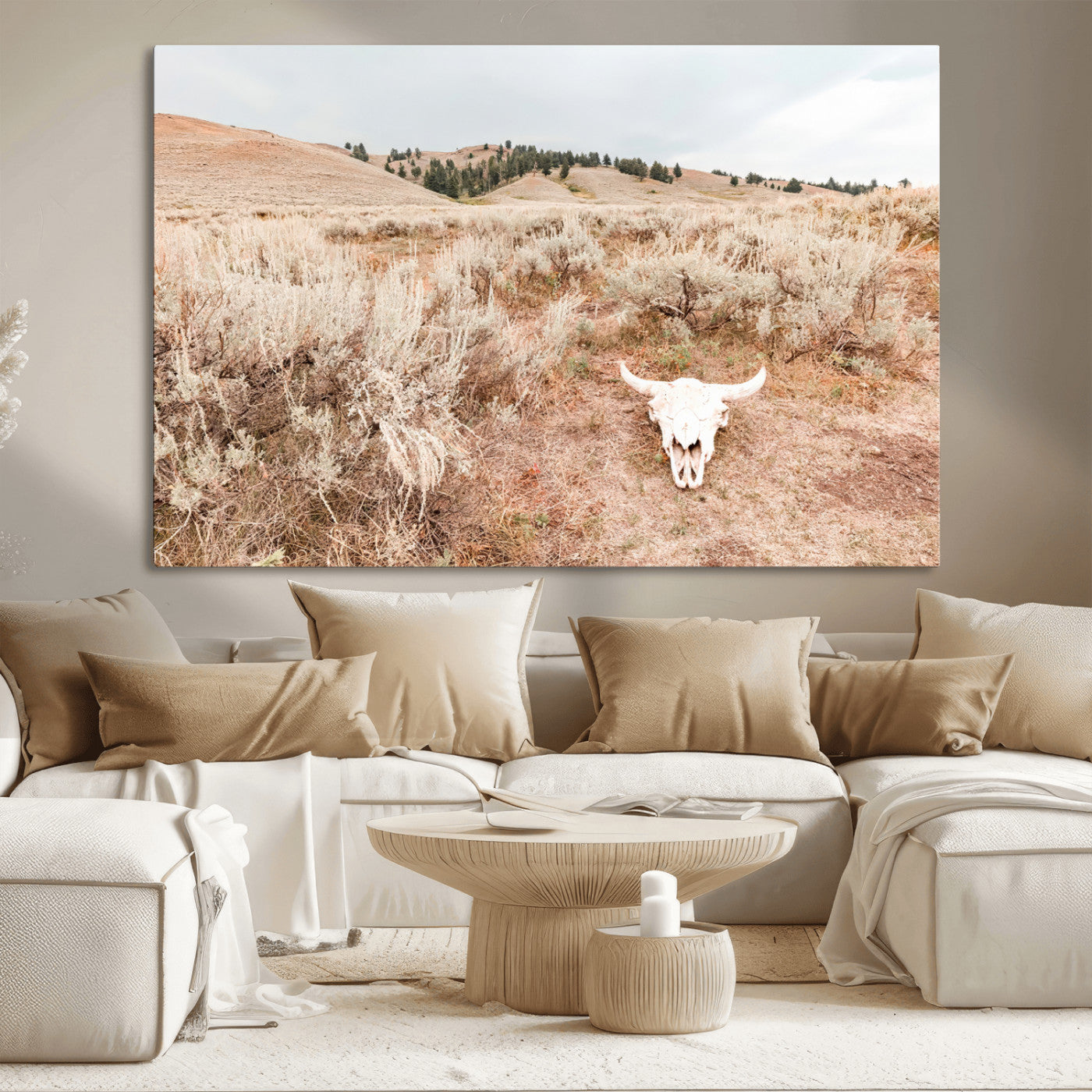 Rustic bull skull on dry sagebrush field under soft light, ideal for western minimal or desert prairie-style wall decoration.