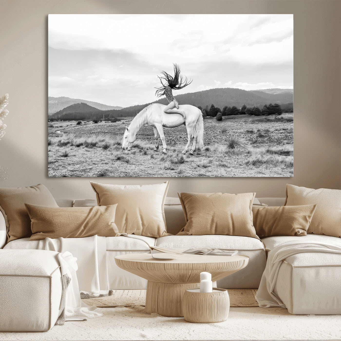 Black and white photo of a woman on a white horse in moody tones, ideal for Western Boho or modern rustic-style home decor.