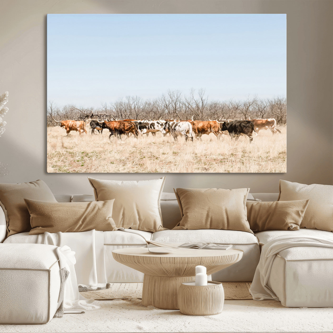 Framed wall art of Texas longhorn cattle walking through a dry, neutral-toned prairie, perfect for rustic farmhouse or western-themed home decor.