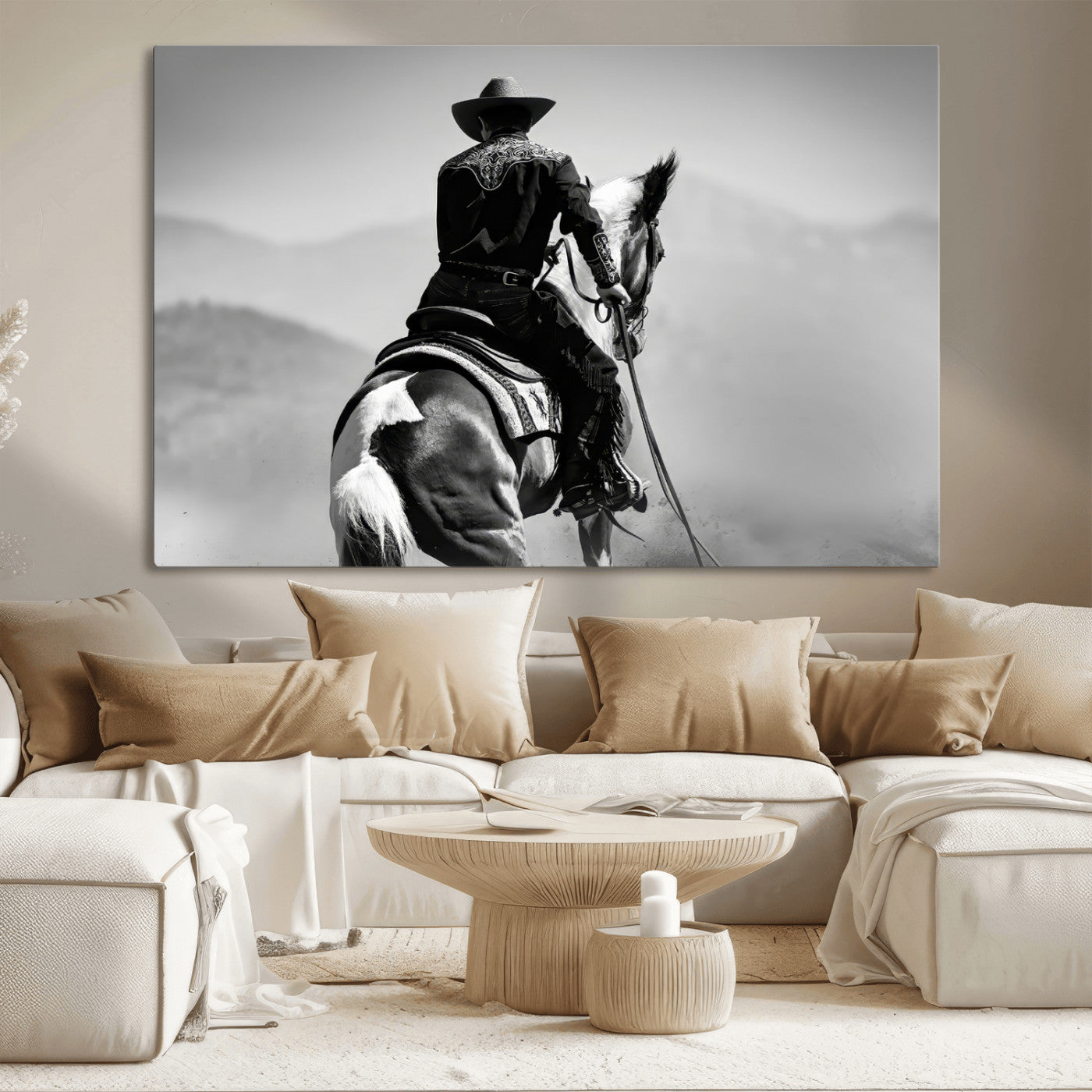 Black and white canvas of a cowboy on horseback with moody tones, perfect for rustic western or country-inspired home decor.