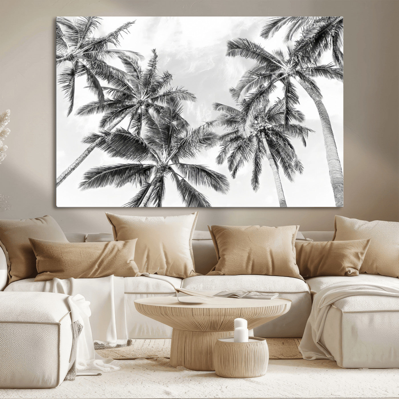 Black and white tropical palm trees viewed from below, swaying gently against a bright sky, creating a serene and elegant coastal atmosphere.