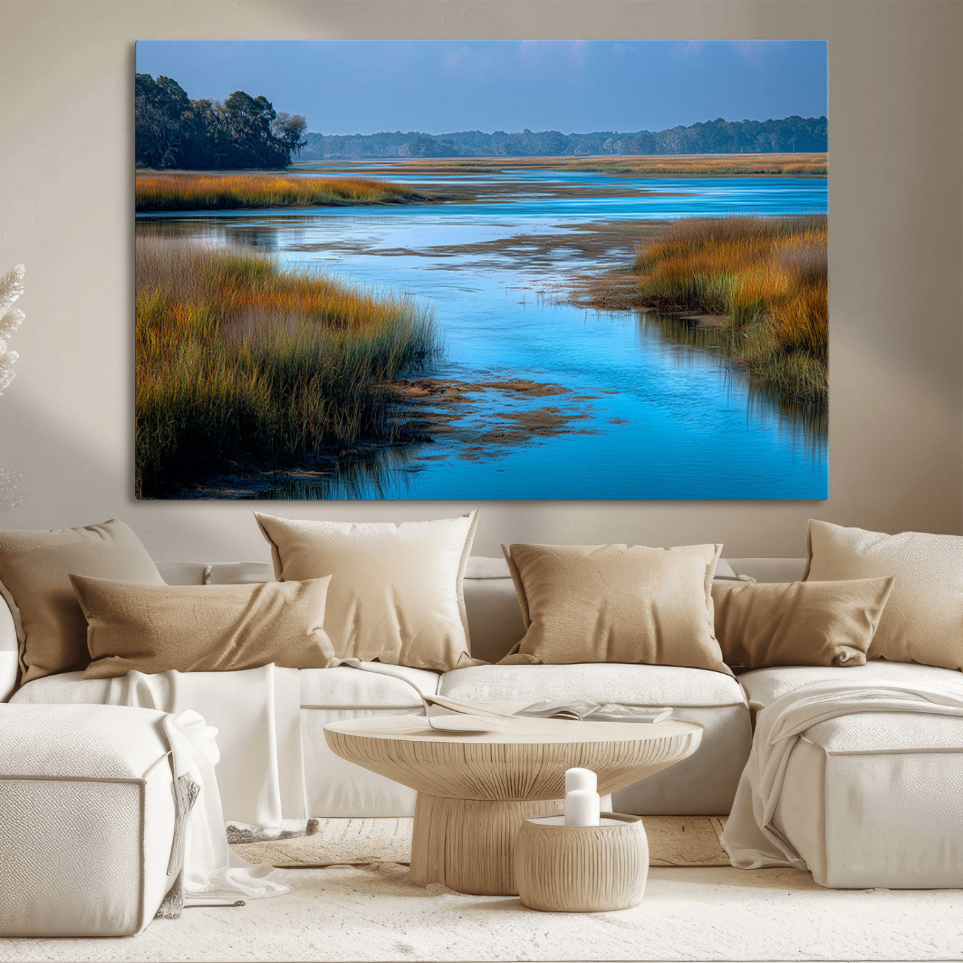 A peaceful marshland scene with calm blue water reflecting the surrounding grasses and trees, capturing the beauty of nature in a serene landscape.