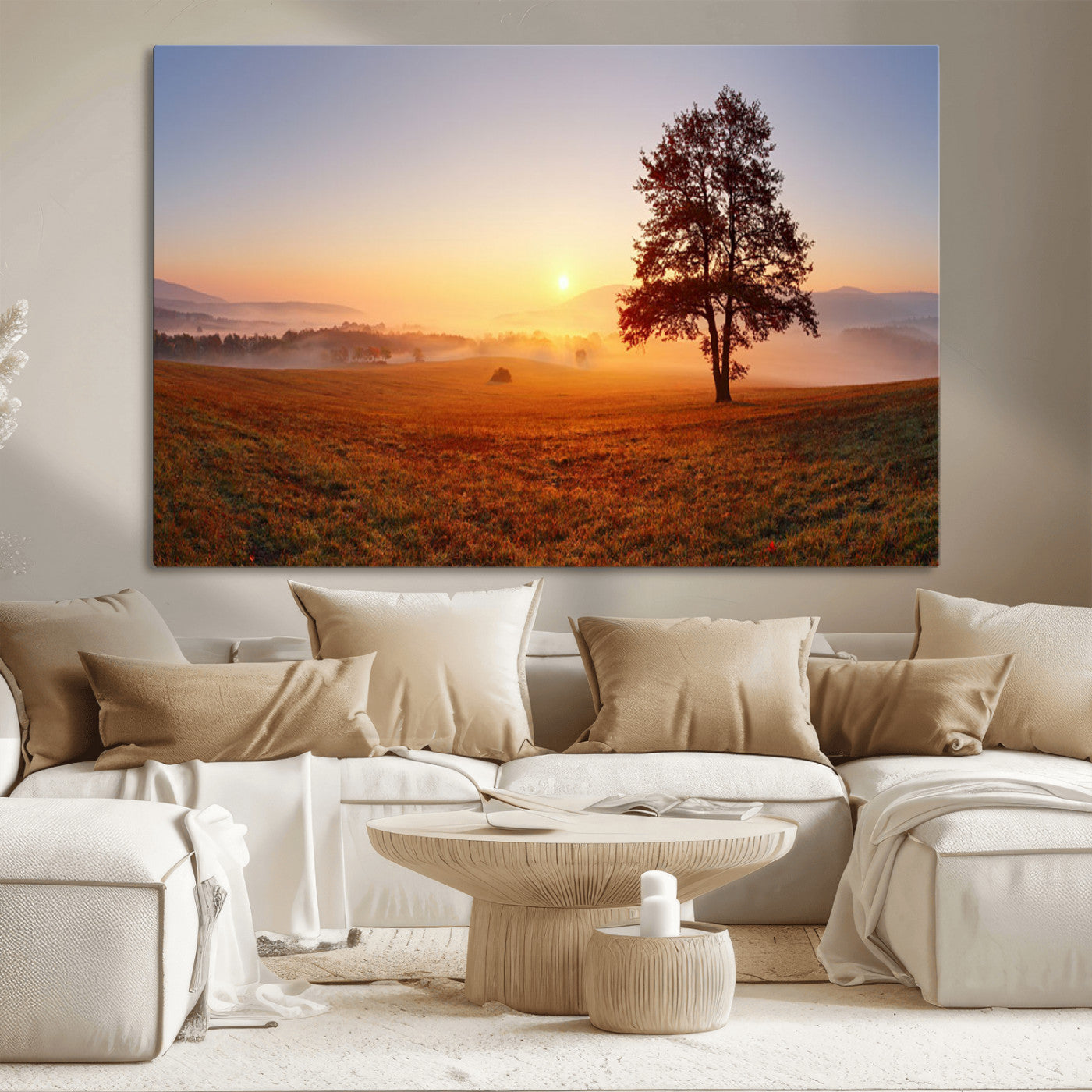 A tranquil landscape at sunrise with a mist-covered field and a lone tree, creating a peaceful and natural atmosphere.