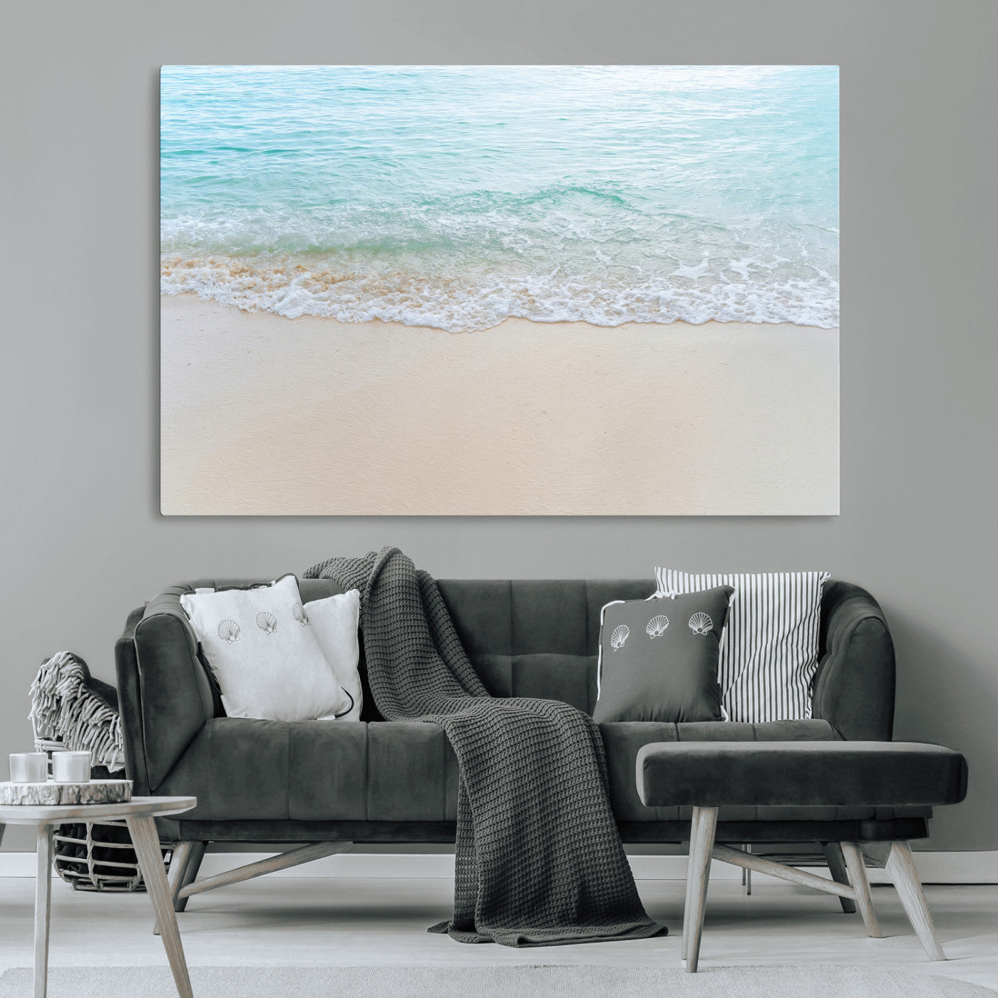 Soft shoreline with gentle aqua waves on smooth sand, ideal for minimalist coastal or pastel ocean-inspired home wall decor.