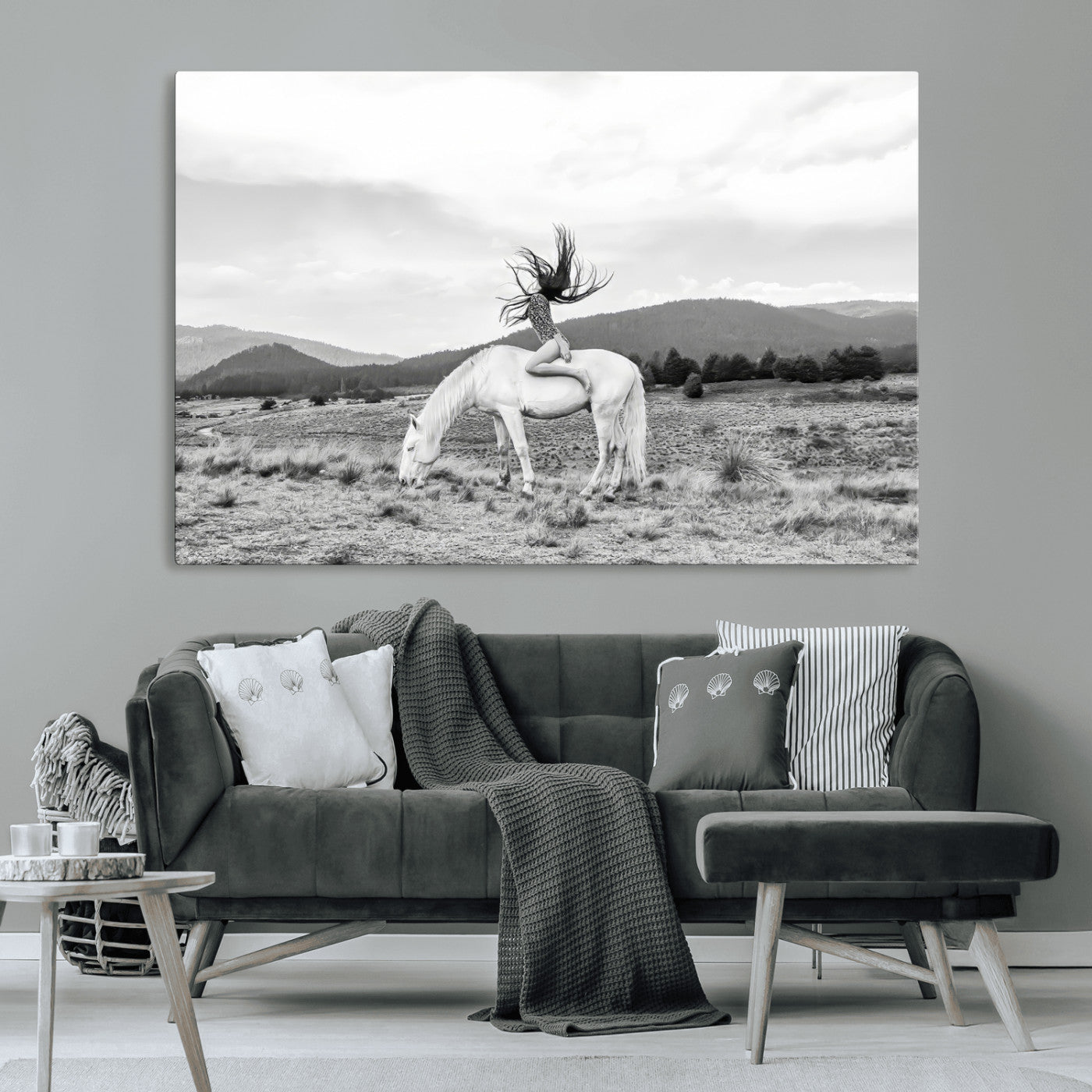 Black and white photo of a woman on a white horse in moody tones, ideal for Western Boho or modern rustic-style home decor.
