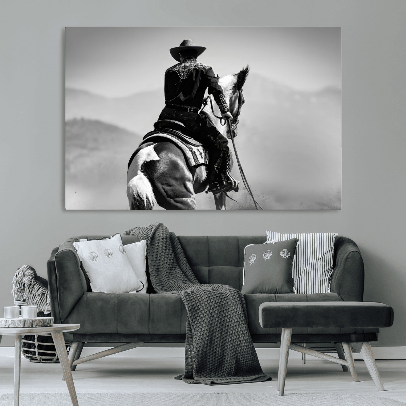 Black and white canvas of a cowboy on horseback with moody tones, perfect for rustic western or country-inspired home decor.