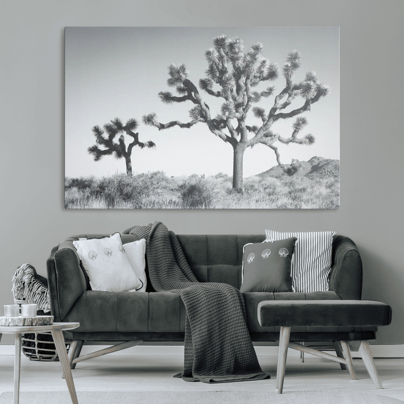 Black and white Joshua tree in a desert landscape with soft light and dry brush, perfect for rustic or minimalist home decor.