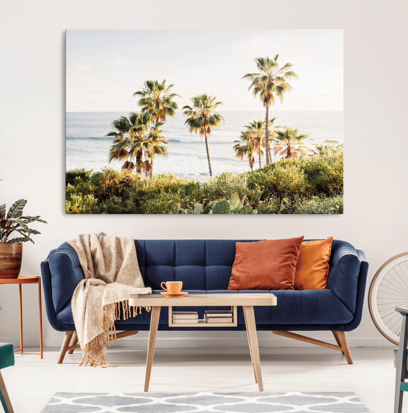 Framed print of sunlit palm trees on the California coast with warm tones, perfect for coastal minimalist or beach-style home decor.