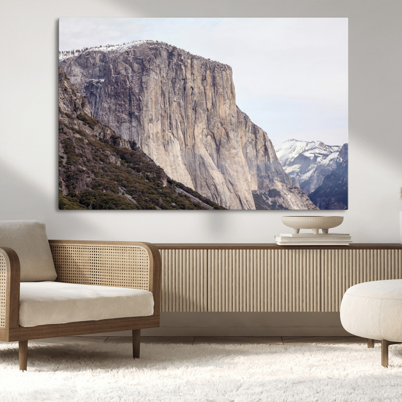 Framed canvas of El Capitan’s vertical granite face in Yosemite with snowy peaks, ideal for Sierra minimalism or mountain-inspired decor.