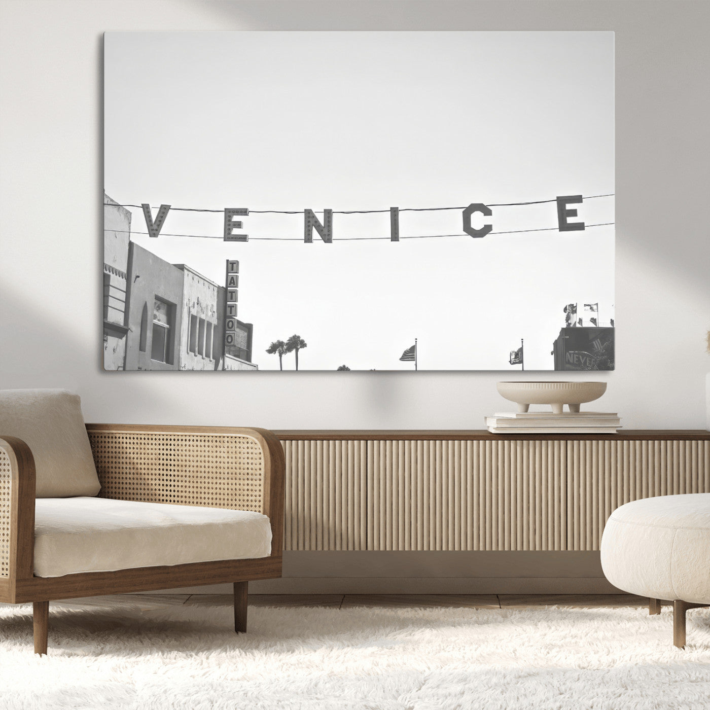 Black and white photo of Venice Beach sign and palm-lined street, perfect for urban coastal or minimalist LA-inspired wall decoration.