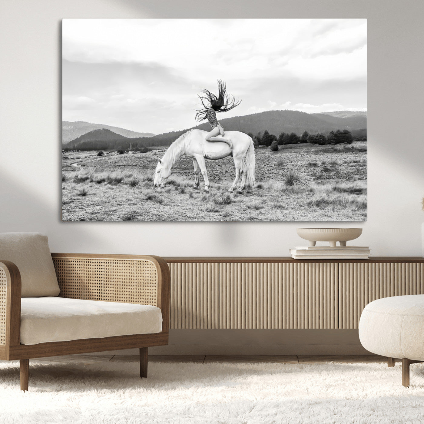 Black and white photo of a woman on a white horse in moody tones, ideal for Western Boho or modern rustic-style home decor.