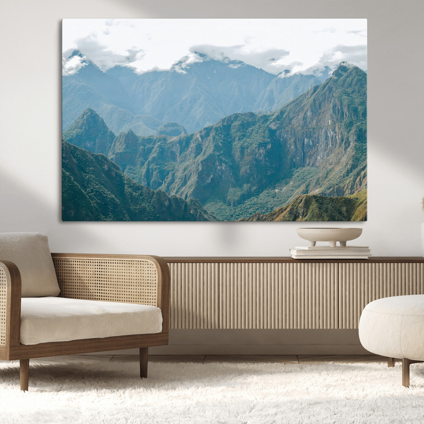 A misty mountain landscape with cloud-covered Andean peaks and lush green valleys, creating a dramatic and serene view, perfect for rustic or nature-inspired home decor.
