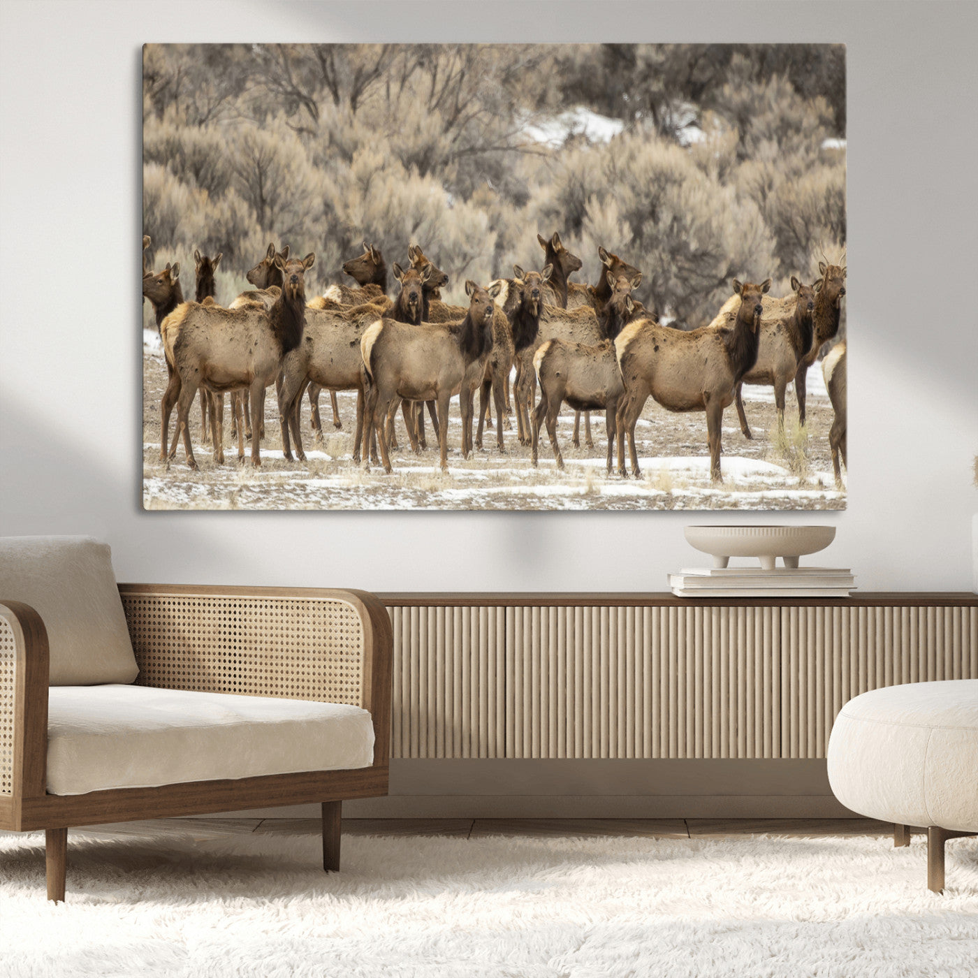 A large herd of elk standing in an open field with soft earthy tones, ideal for rustic lodge or western-themed home wall decor.