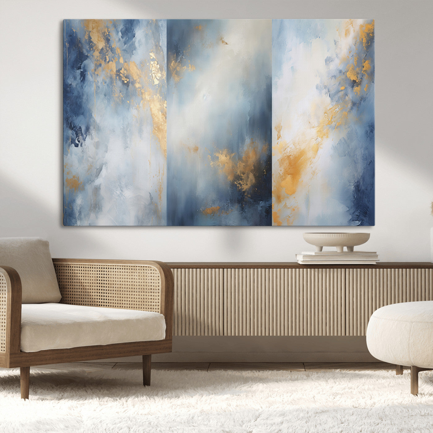 Abstract canvas art in soft blue and gold tones with textured brushstrokes, ideal for elegant or modern neutral decor spaces.