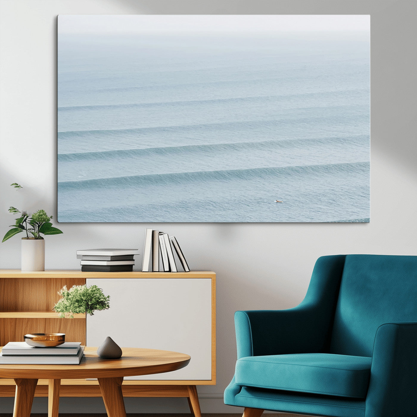 Framed canvas of repeating ocean waves with a distant solo surfer, ideal for minimalist ocean or calm coastal wall decor.