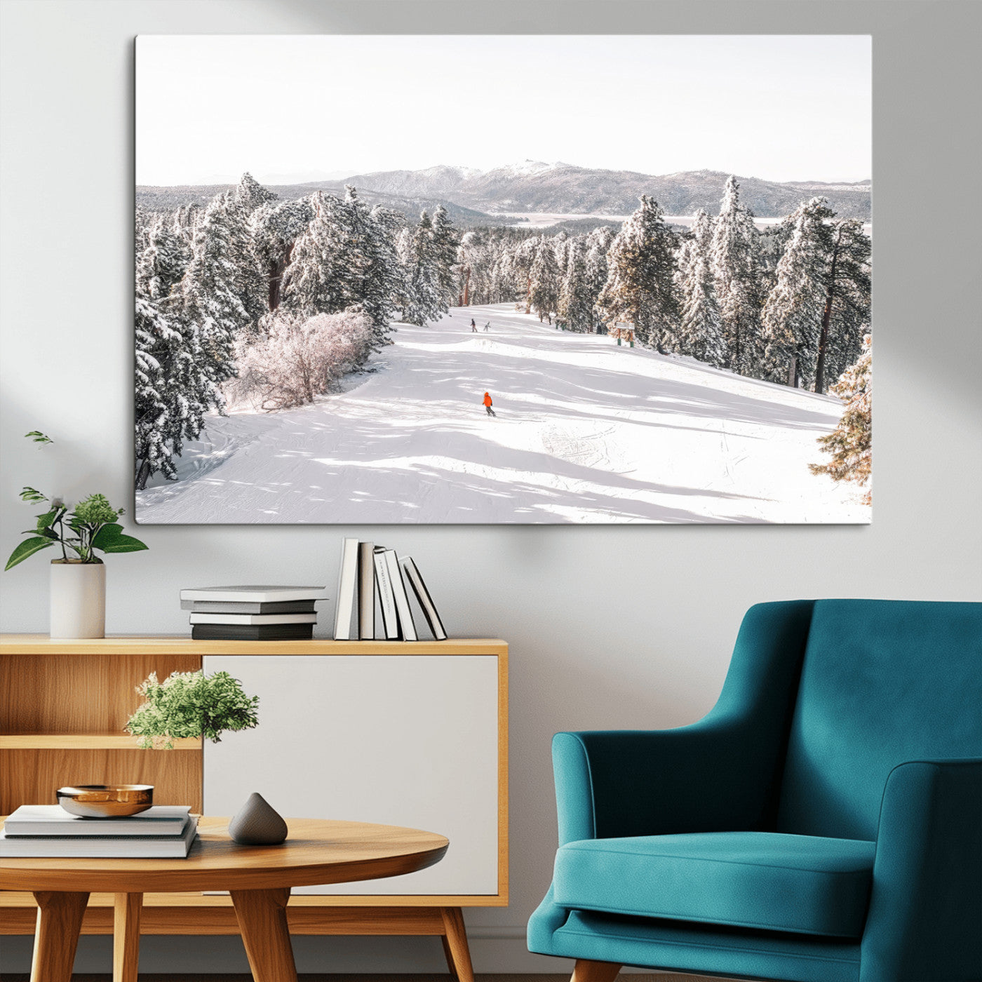 Bright ski trail lined with snow-covered pines and a skier in orange, perfect for alpine adventure or winter sports-inspired decor.