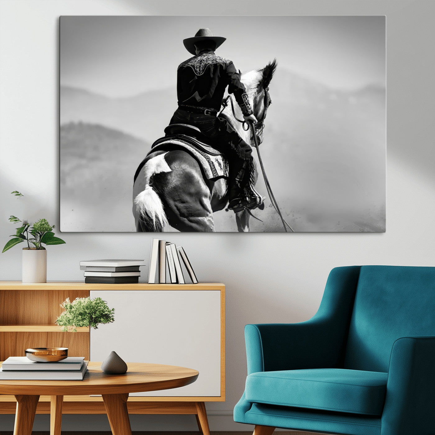 Black and white canvas of a cowboy on horseback with moody tones, perfect for rustic western or country-inspired home decor.