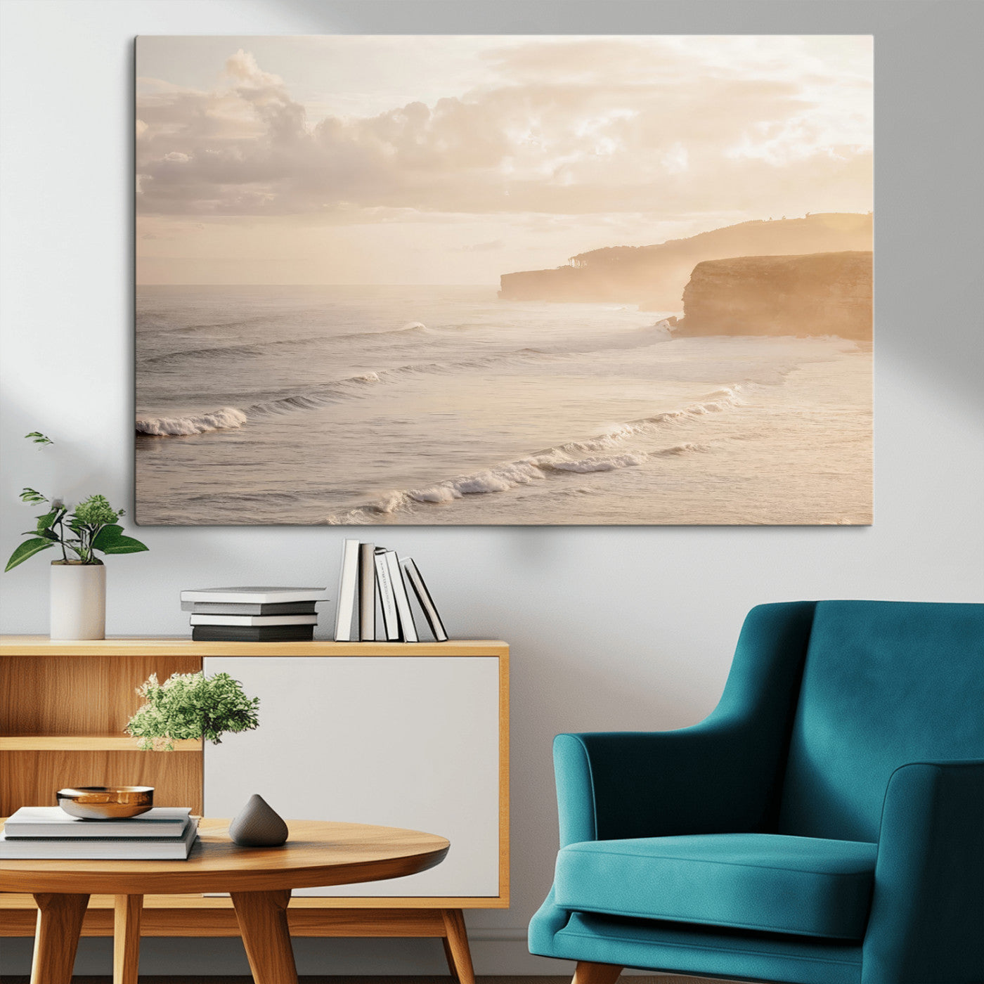 Golden hour seascape with misty cliffs and gentle waves rolling towards the shore, capturing a tranquil and warm coastal atmosphere.