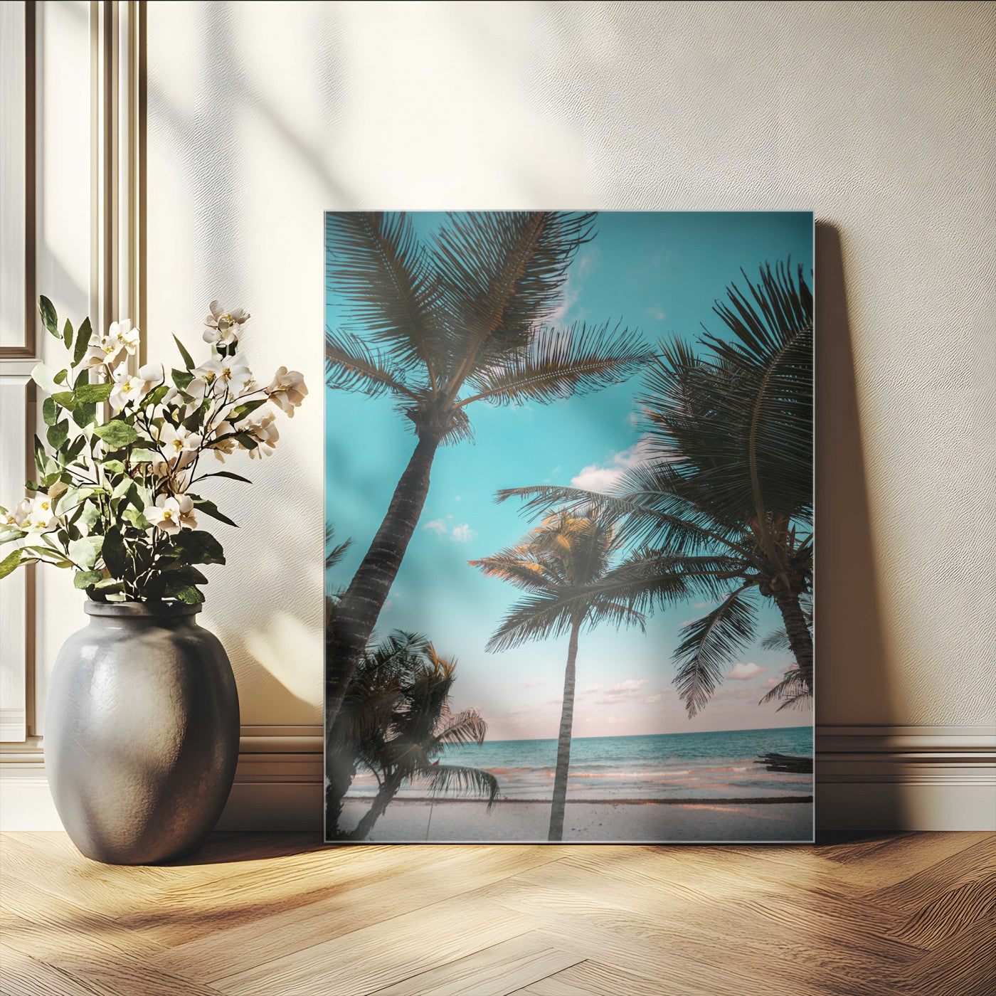 Tall palm trees swaying over a tropical beach with turquoise ocean waves and a soft sunset glow, creating a relaxing coastal vibe.