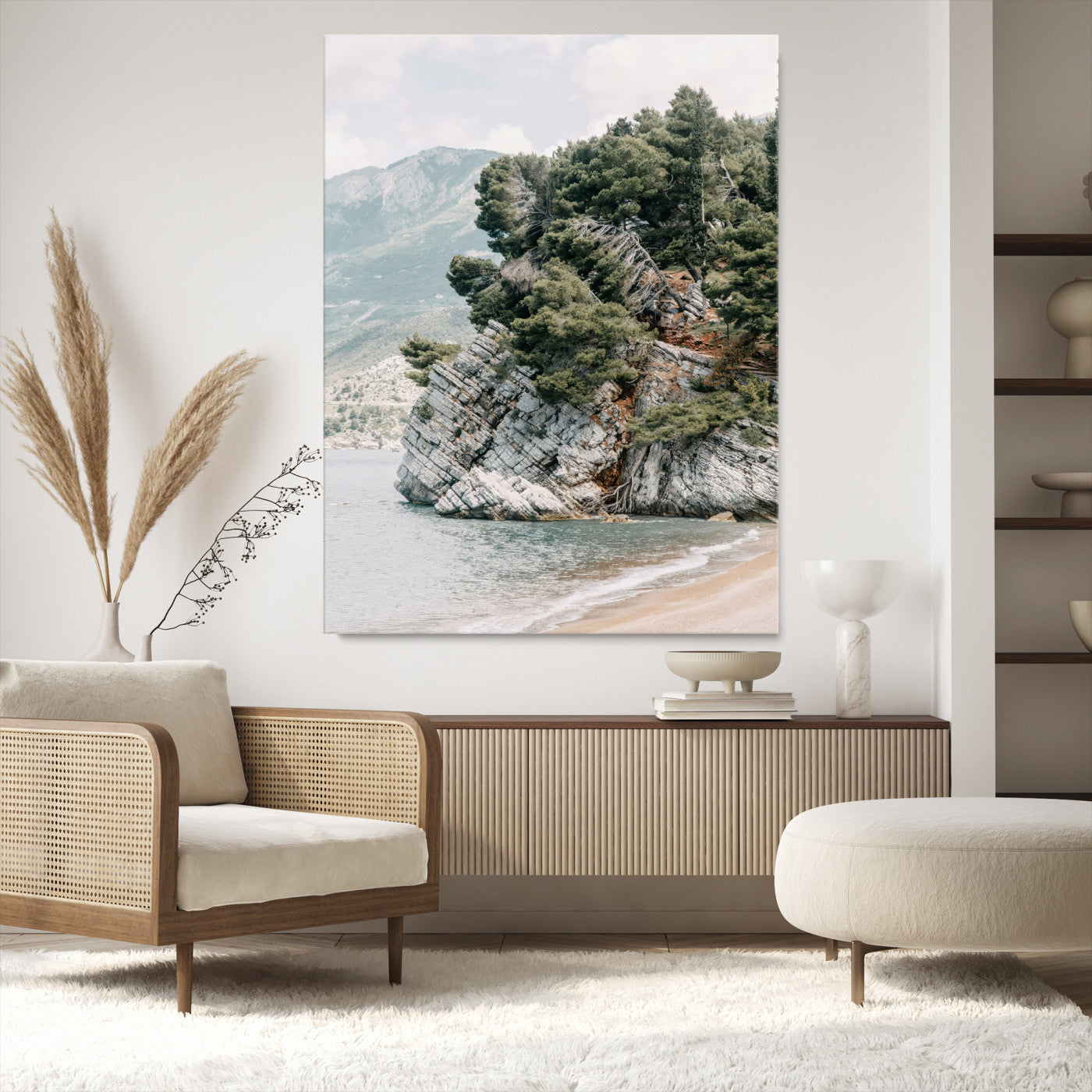 Framed photo of a rocky coastal cliff with dense greenery and calm shoreline, ideal for rustic coastal or earthy-toned home decor.