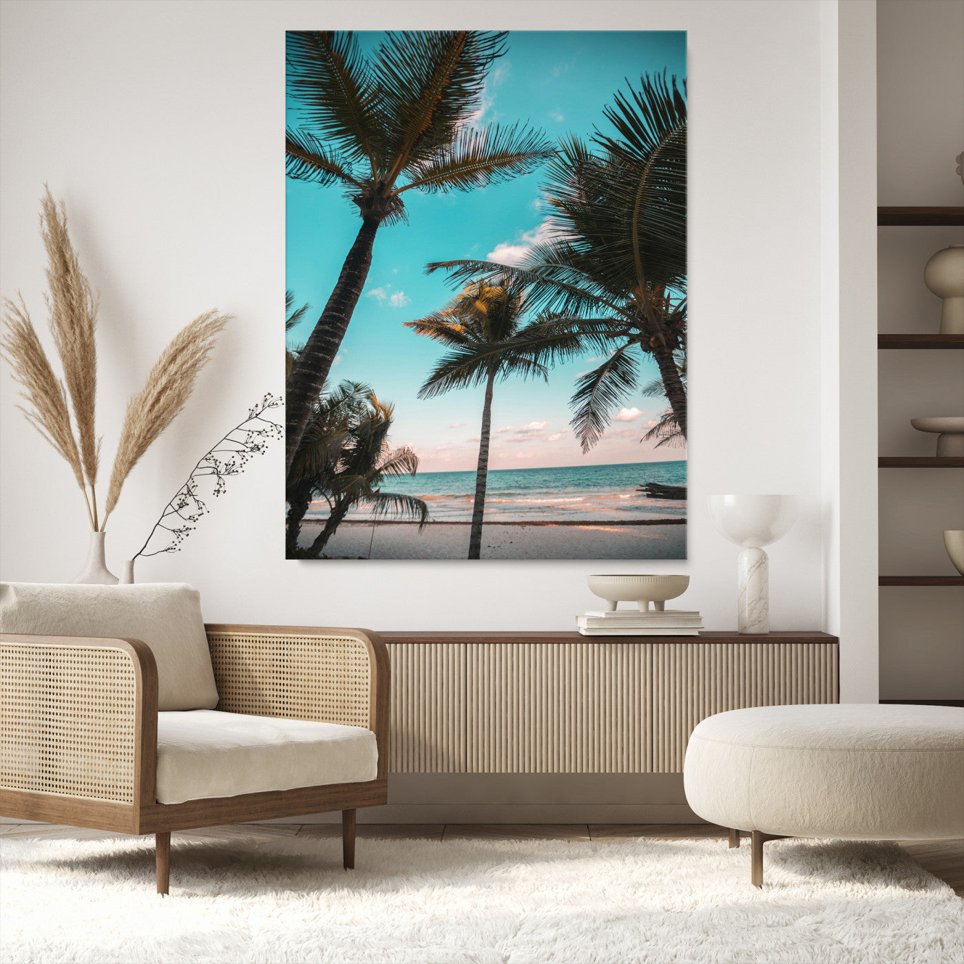 Tall palm trees swaying over a tropical beach with turquoise ocean waves and a soft sunset glow, creating a relaxing coastal vibe.