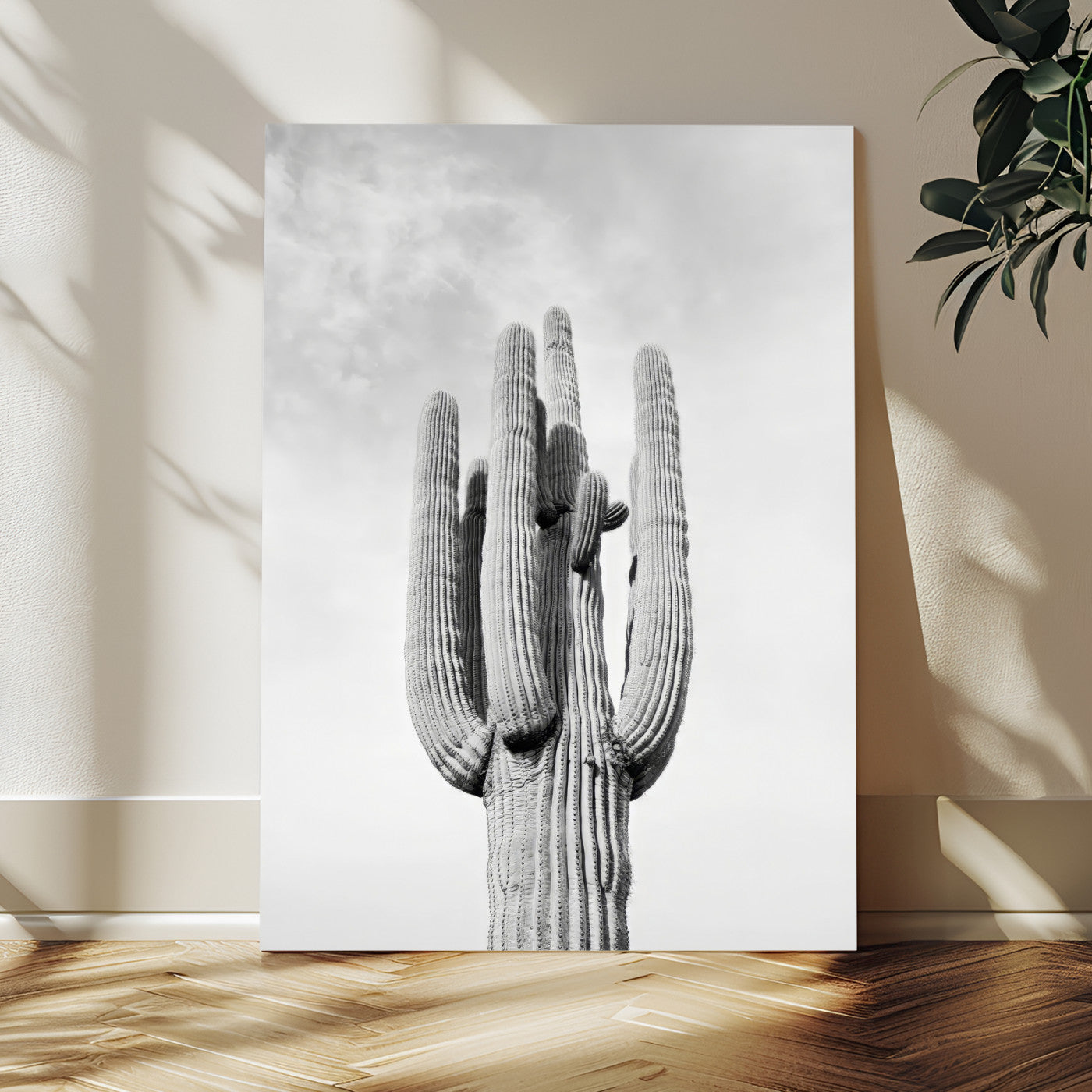 Canvas of a tall saguaro cactus in black and white with moody tones, perfect for southwestern minimalist or modern desert-themed home decor.
