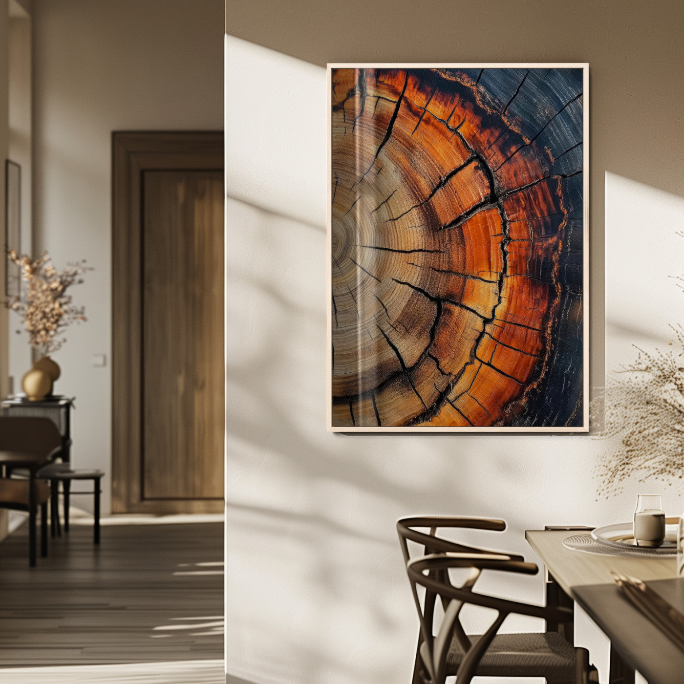 Framed canvas of burnt tree rings with rich wood texture and warm tones, ideal for rustic or earth-inspired interior decor.