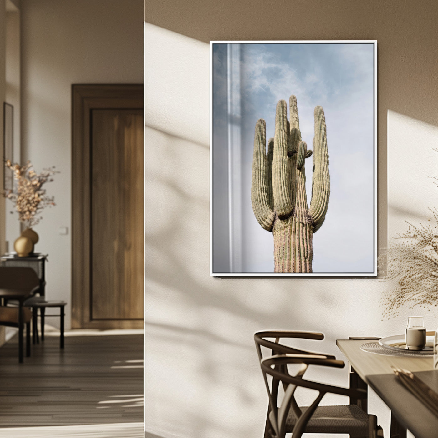 Vertical photo of a tall saguaro cactus against a soft sky, ideal for earthy or Southwestern home decor with warm neutral tones.