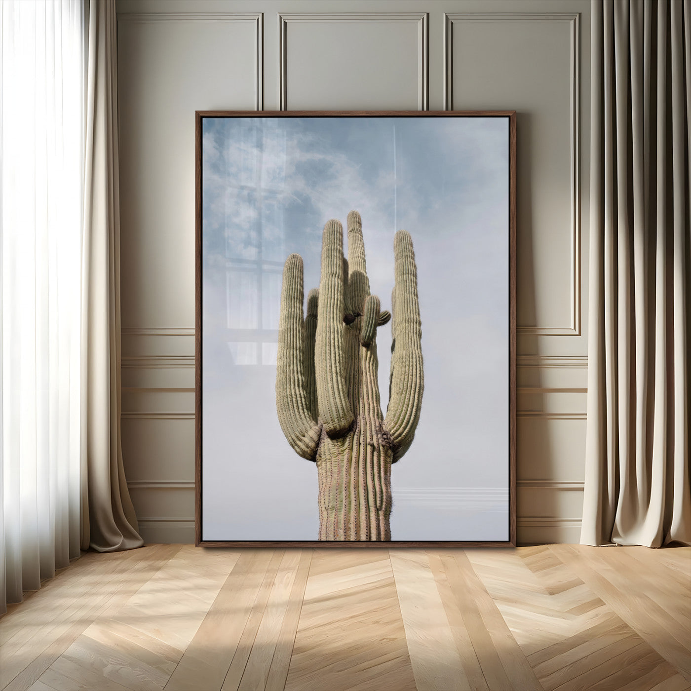 Vertical photo of a tall saguaro cactus against a soft sky, ideal for earthy or Southwestern home decor with warm neutral tones.