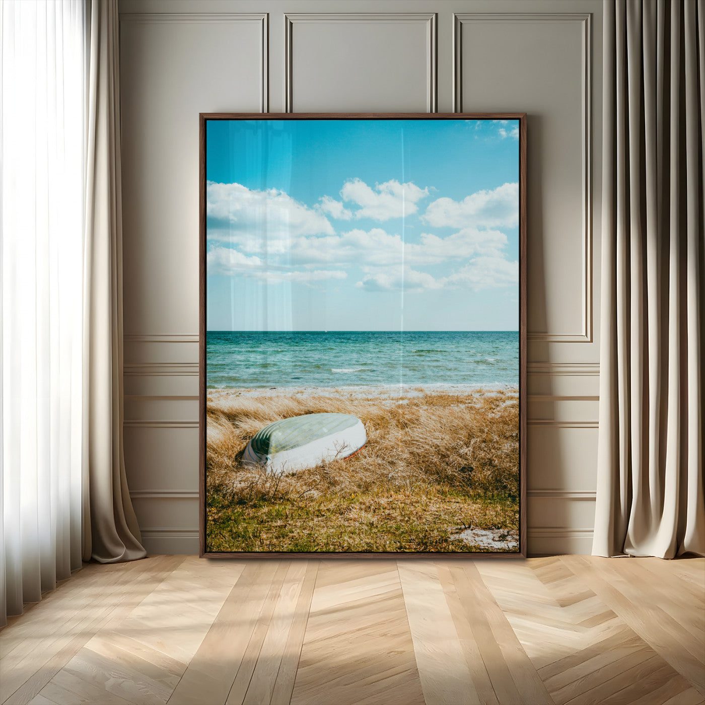 A small boat resting on a grassy shore with ocean waves and a bright blue sky, creating a peaceful coastal atmosphere.