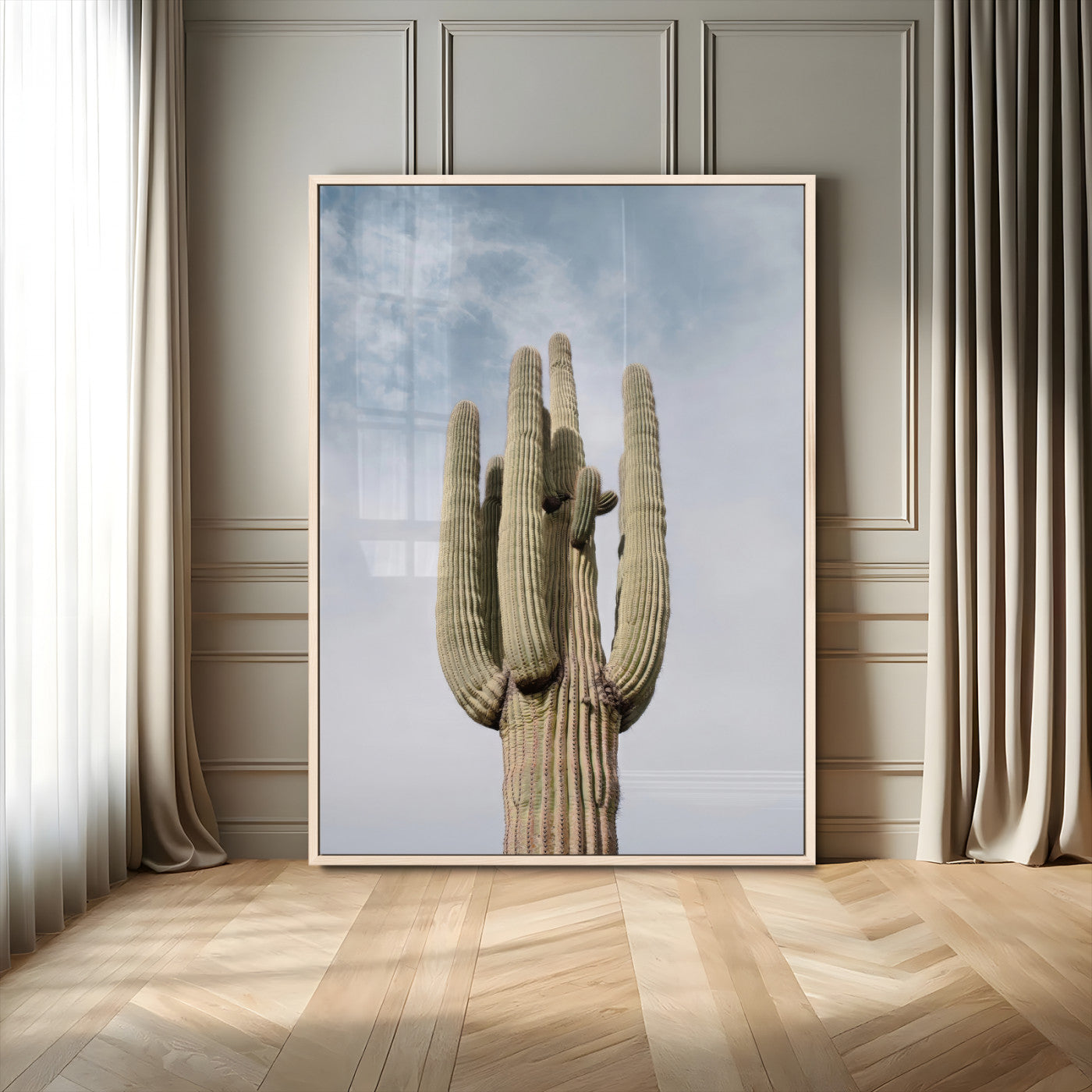 Vertical photo of a tall saguaro cactus against a soft sky, ideal for earthy or Southwestern home decor with warm neutral tones.