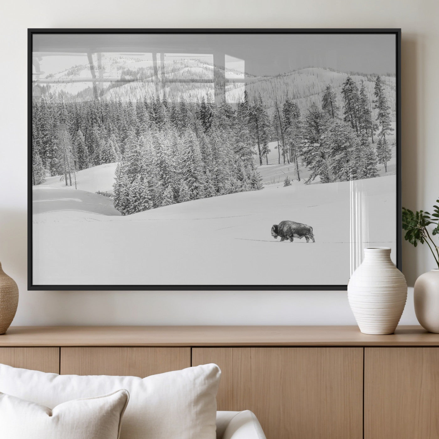 Snowy bison walking through white forest landscape, ideal for monochrome winter or wilderness-style interior wall decoration.