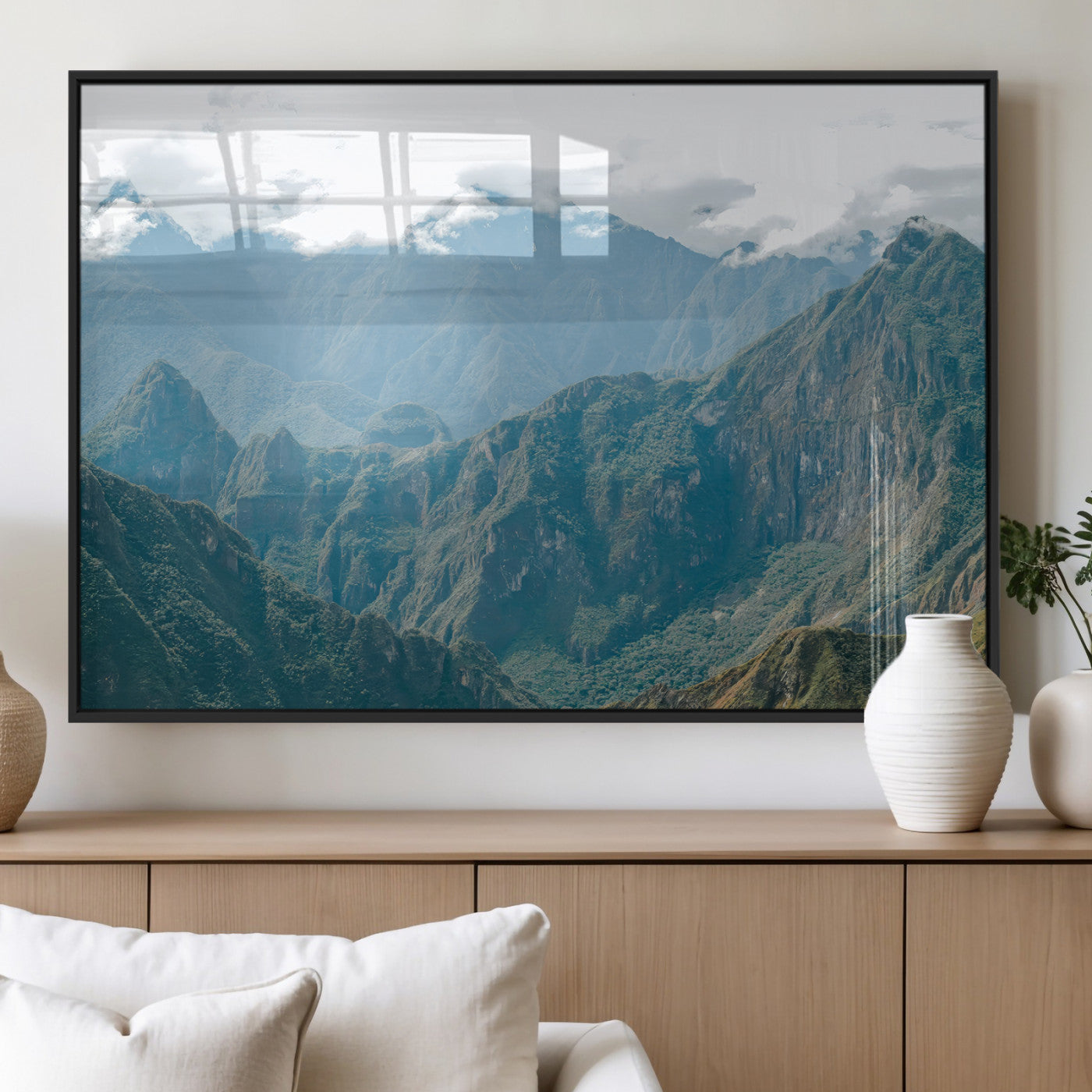 A misty mountain landscape with cloud-covered Andean peaks and lush green valleys, creating a dramatic and serene view, perfect for rustic or nature-inspired home decor.