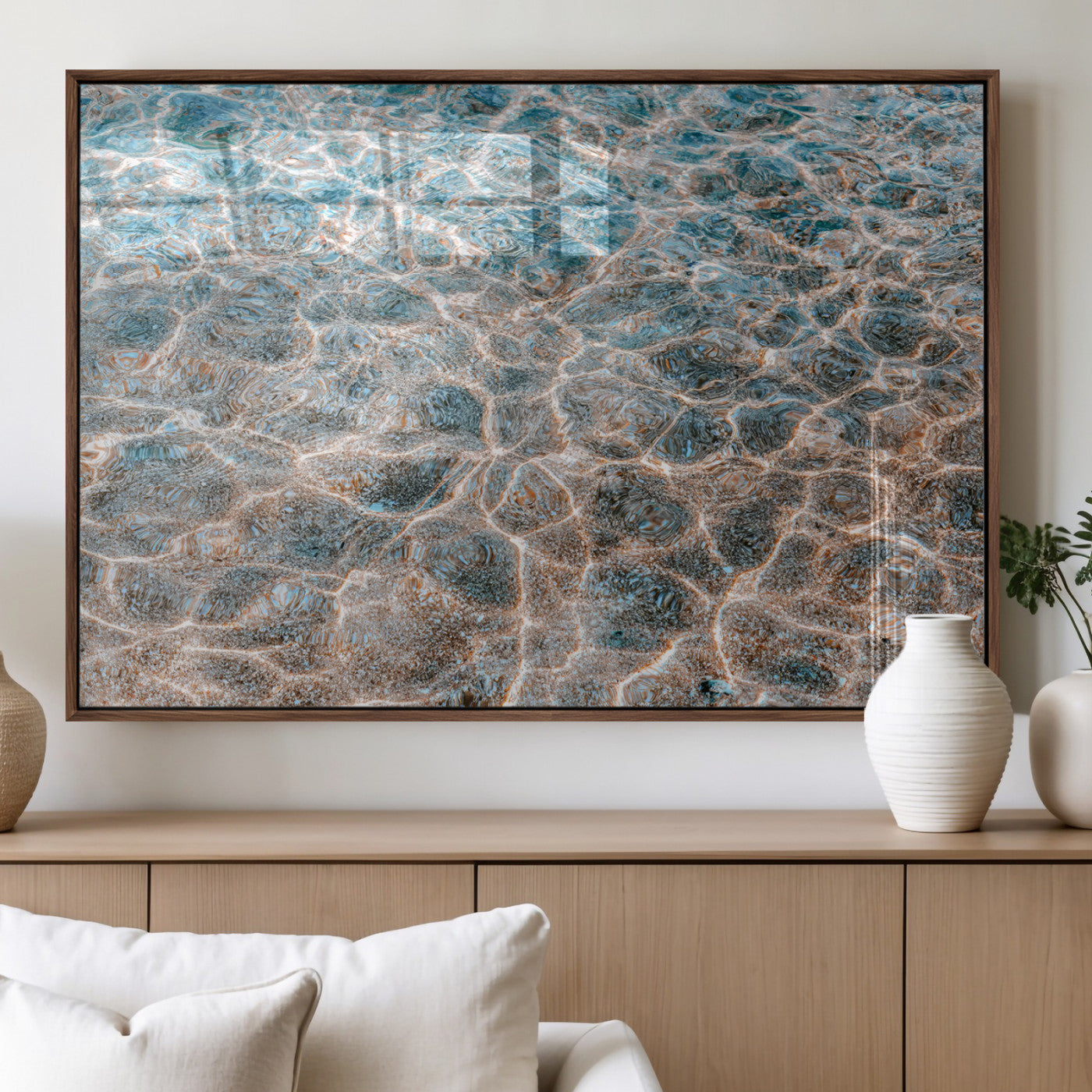 Close-up of sunlit ocean ripples with aqua blue and golden tones, ideal for modern coastal or minimalist home decor.