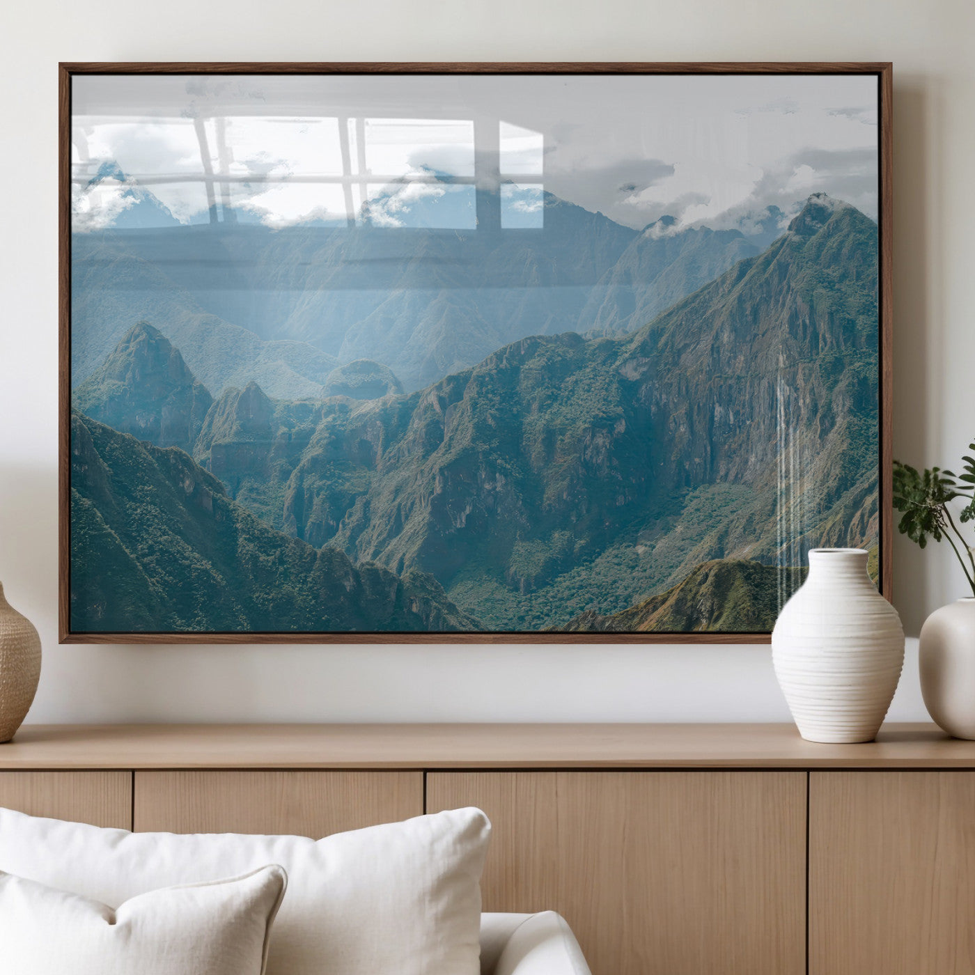 A misty mountain landscape with cloud-covered Andean peaks and lush green valleys, creating a dramatic and serene view, perfect for rustic or nature-inspired home decor.