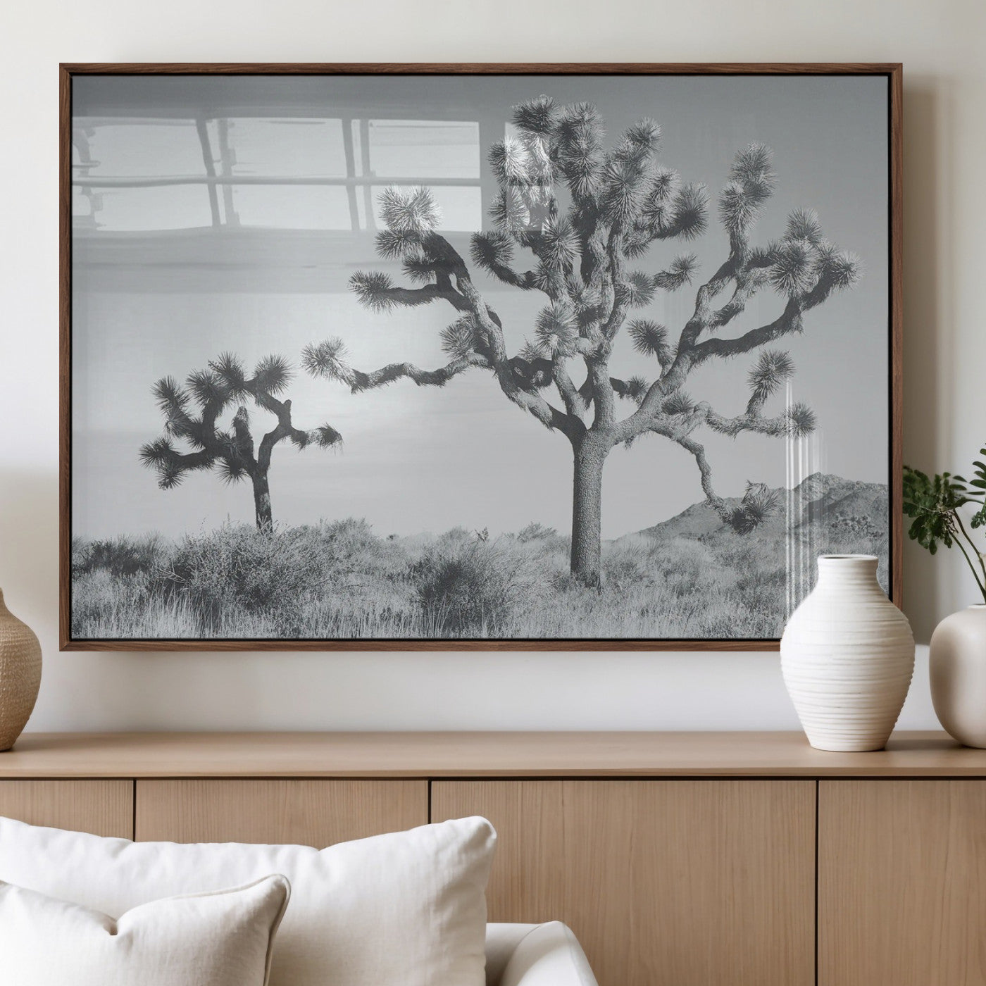 Black and white Joshua tree in a desert landscape with soft light and dry brush, perfect for rustic or minimalist home decor.