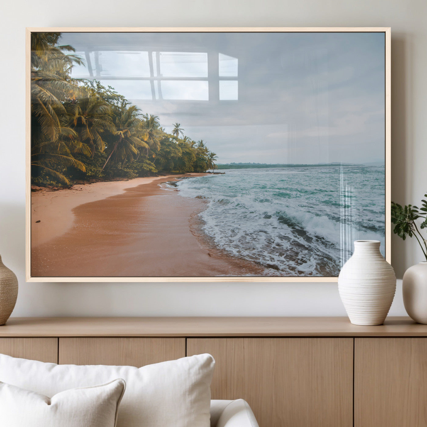 Framed canvas of a tropical beach with palm trees and soft waves, ideal for coastal escape or serene nature-inspired home decor.