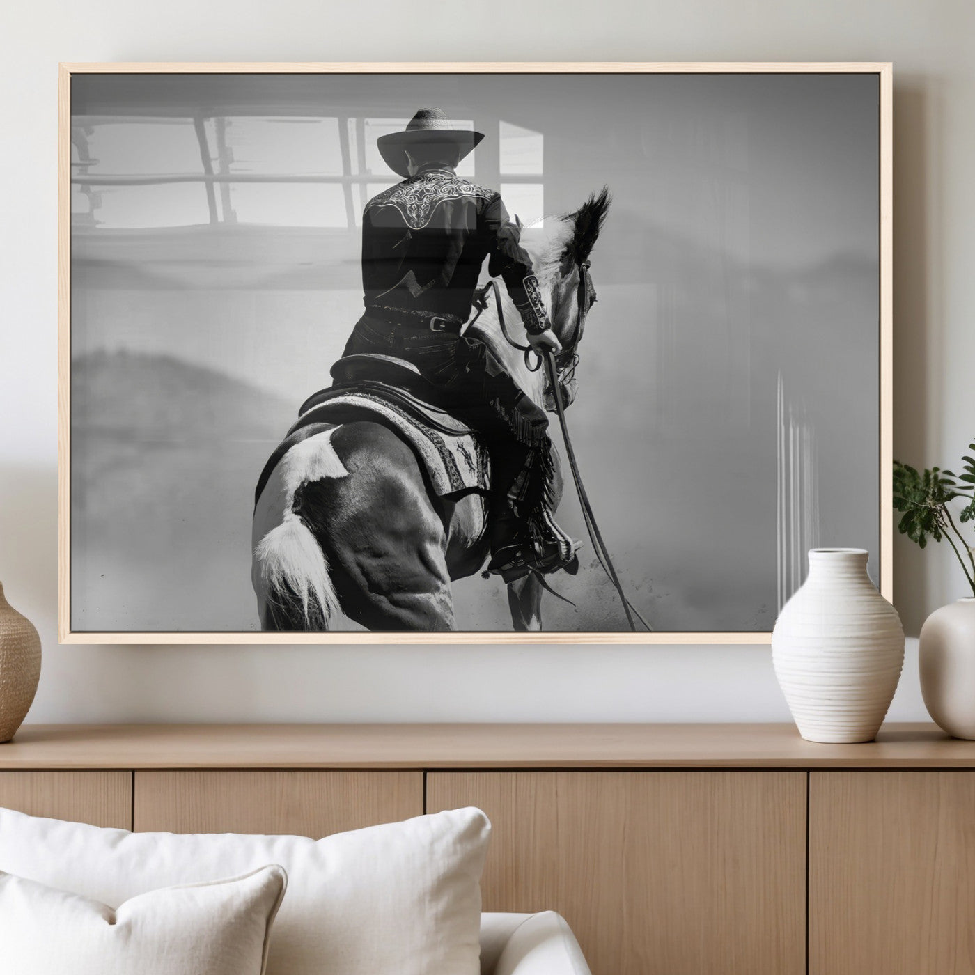 Black and white canvas of a cowboy on horseback with moody tones, perfect for rustic western or country-inspired home decor.