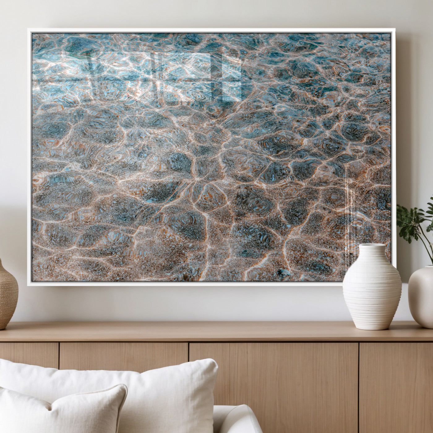 Close-up of sunlit ocean ripples with aqua blue and golden tones, ideal for modern coastal or minimalist home decor.